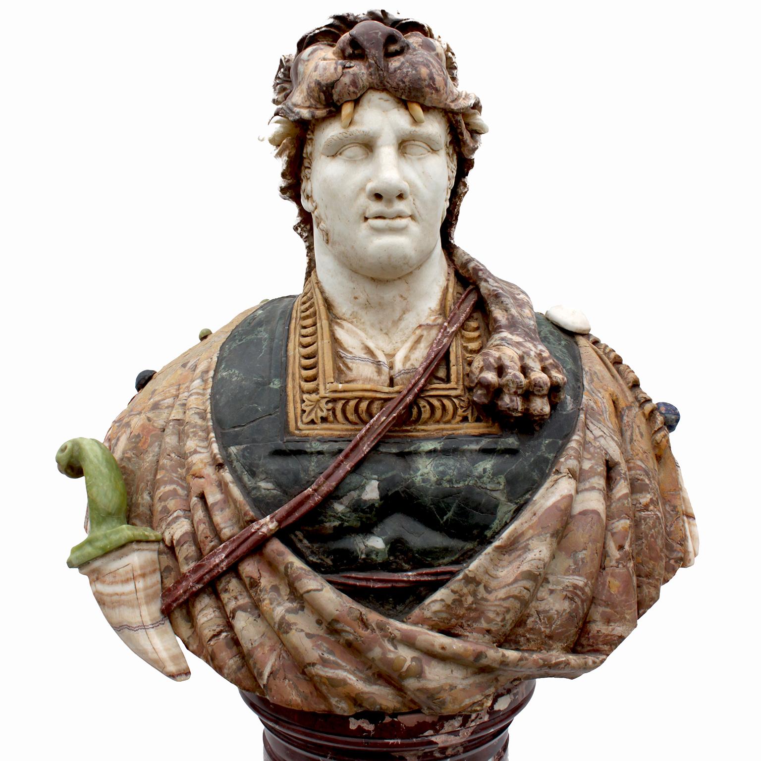 A very fine and mpressive life-size Italian, early 20th century marble bust of a Greco Roman Warrior, probably Hercules, after the antique. The large beautifully carved and decorated bust of a male warrior, depicted with an off-white marble head
