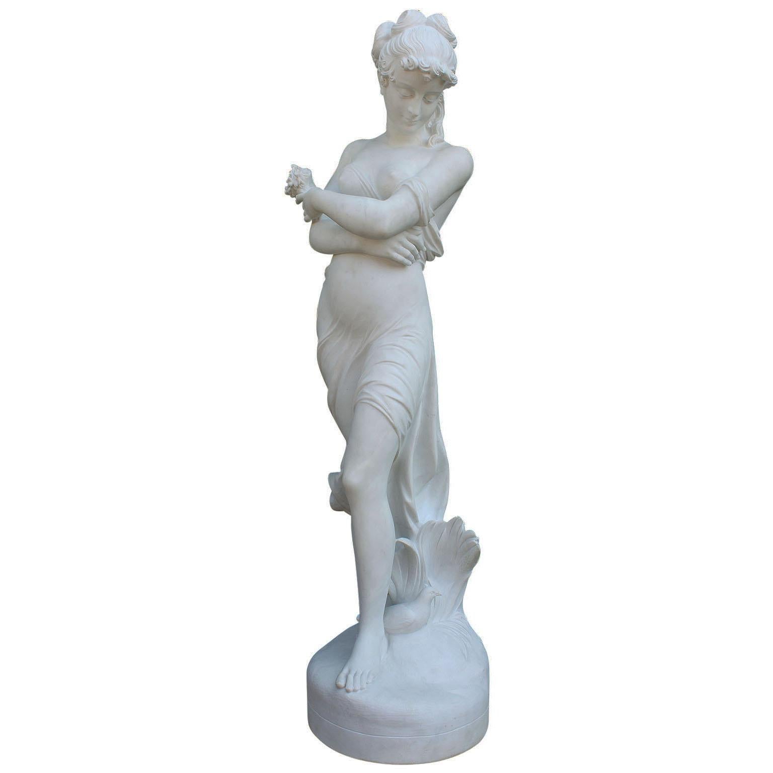 A lifesize carved Italian 20th century Carrara marble figure of 