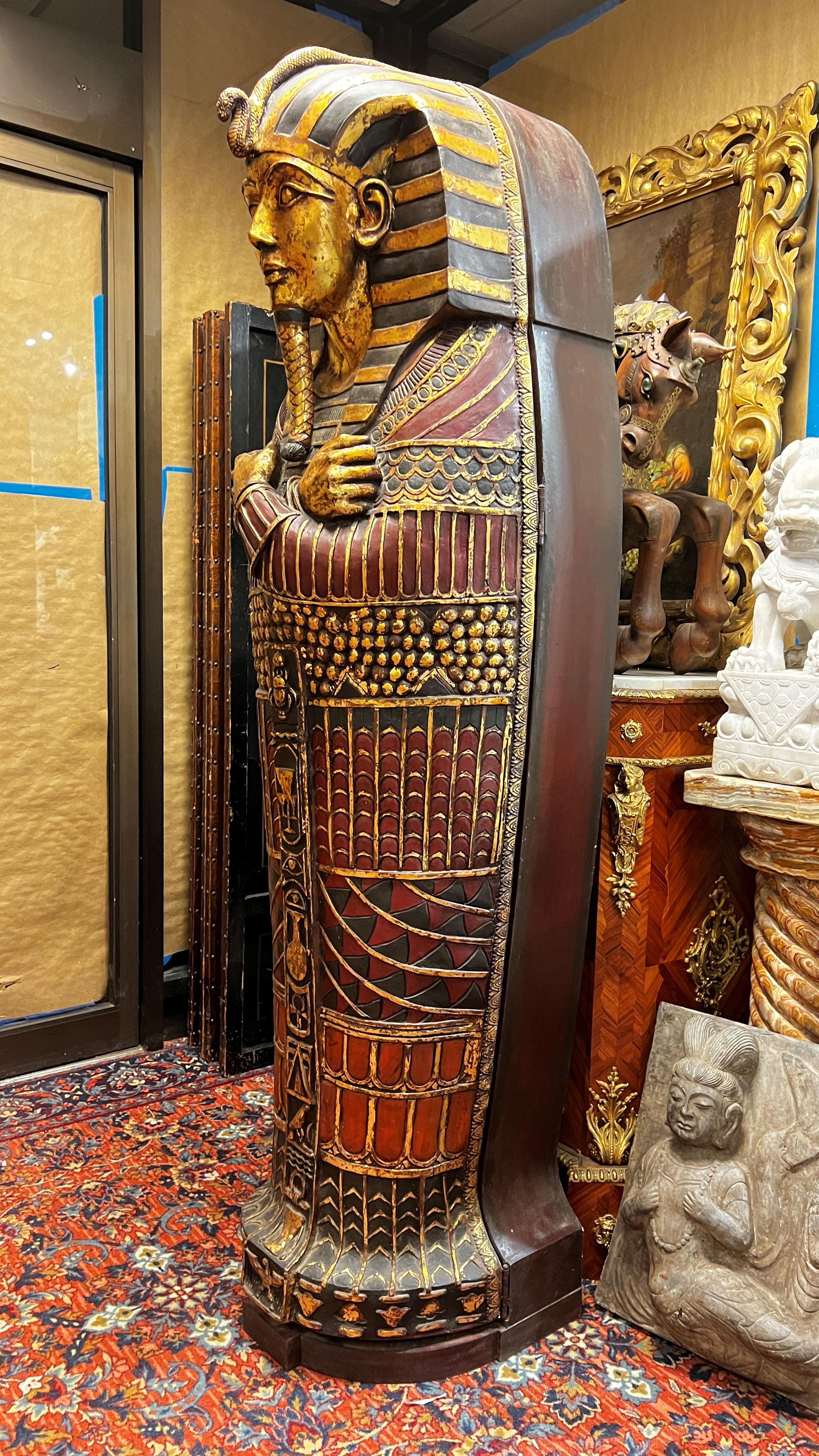 Life size King Tut Sarcophagus wooden bookcase or bar.