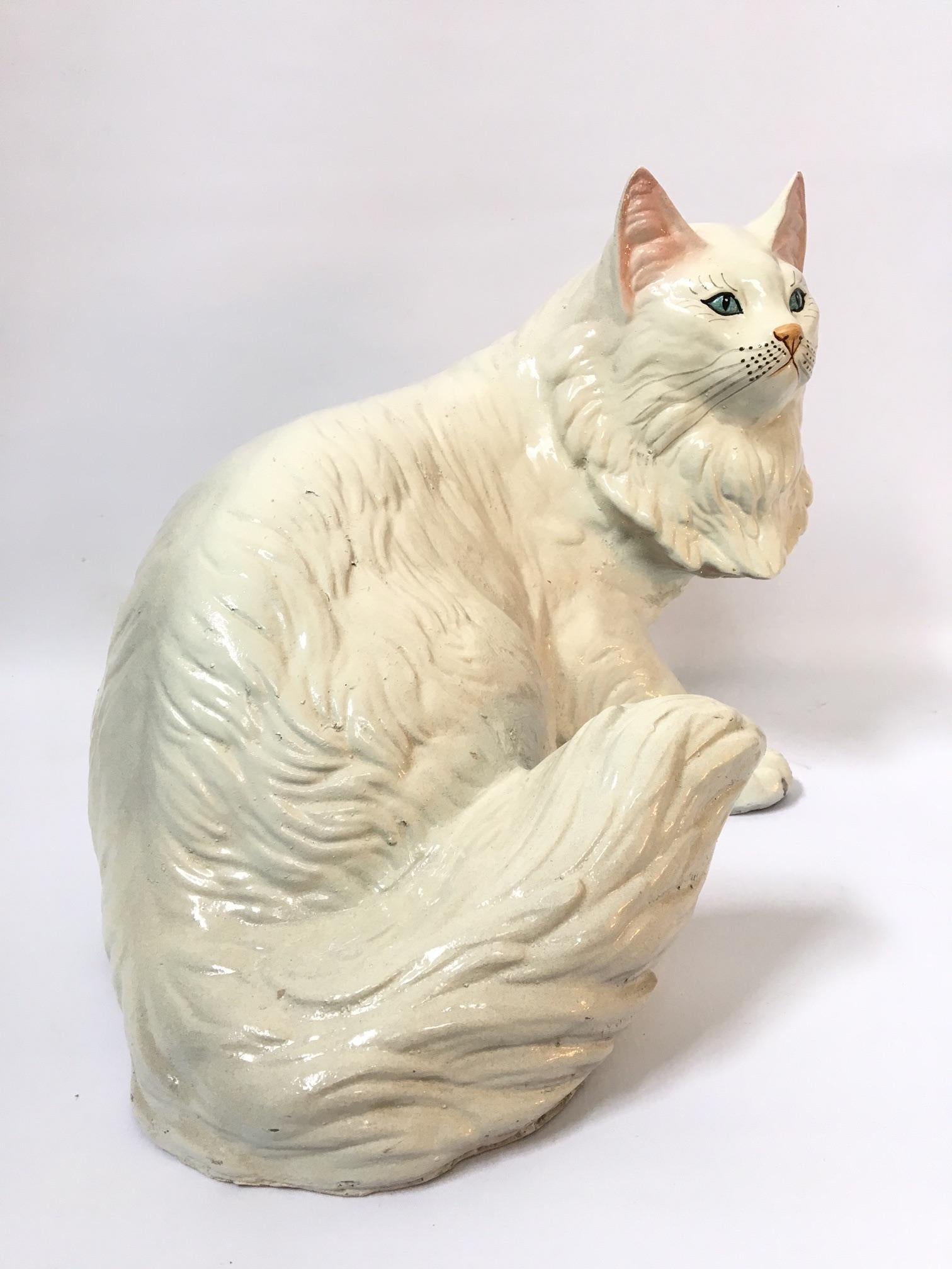 This vintage Persian cat sculpture by Marwal Industries is a rare find in this condition. Other than small manufacturing flaws, she has one pinhead-sized chip on the back of her head.