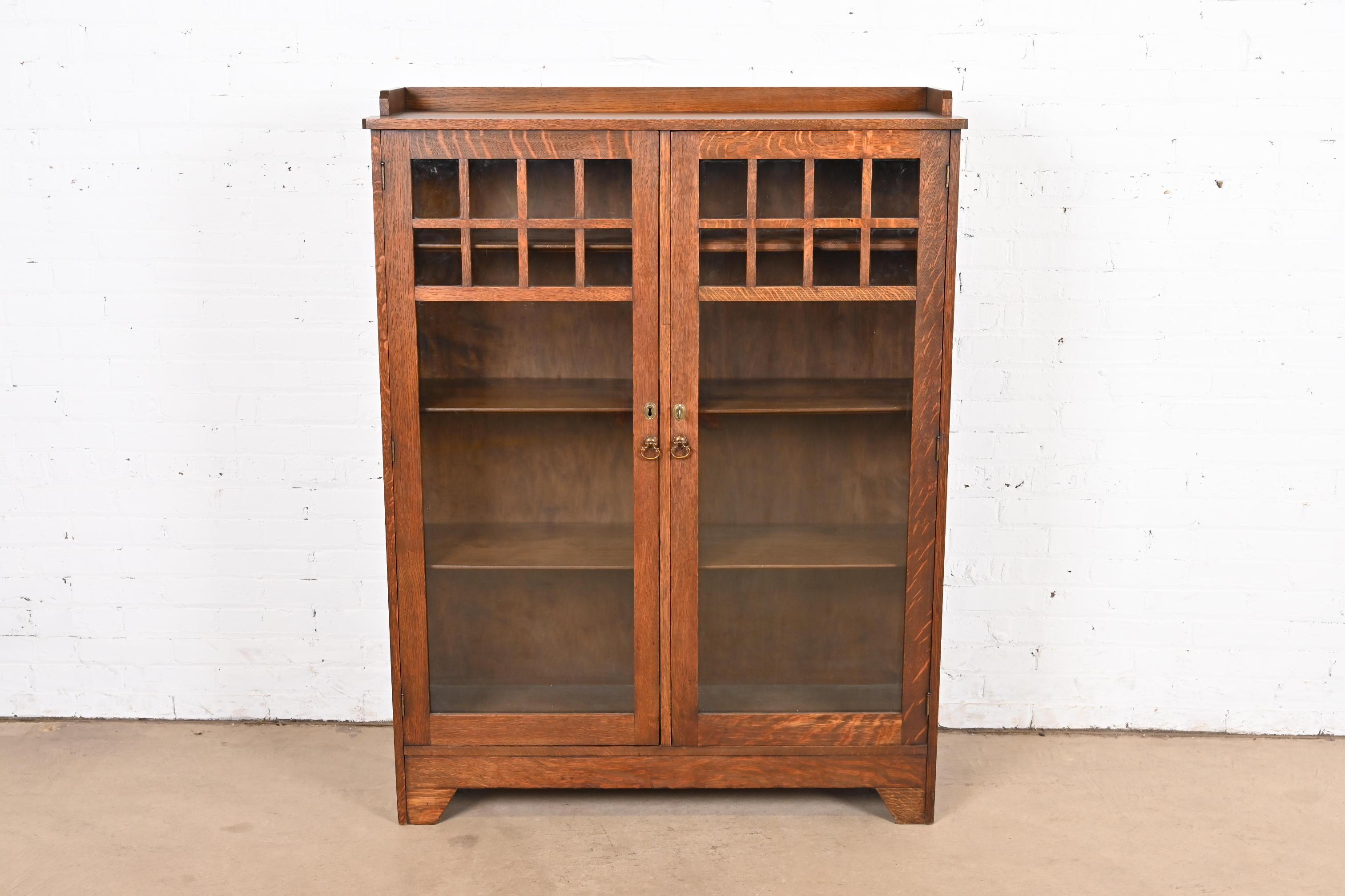 A beautiful Mission or Arts & Crafts period glass front bookcase cabinet

By Lifetime Furniture

USA, Circa 1900

Gorgeous quarter sawn oak, with mullioned glass front doors and brass hardware. Shelves are adjustable.

Measures: 42.25