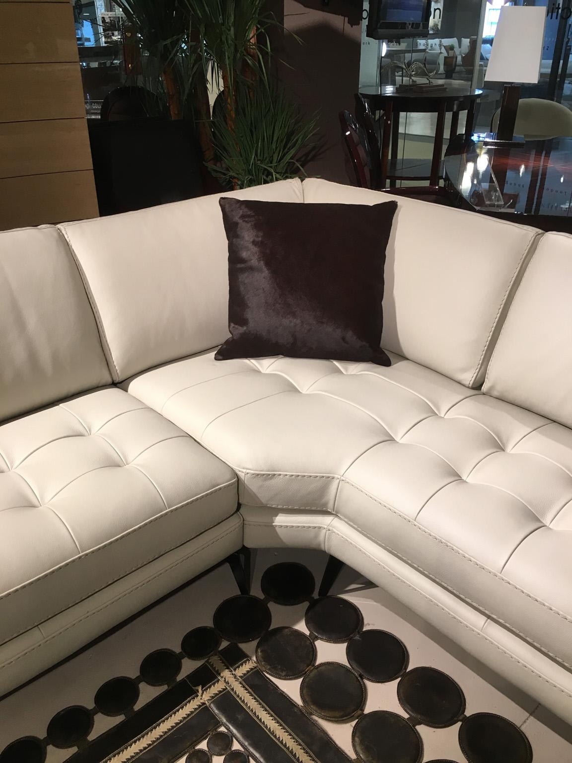 Italian made Lifetime leather sectional, Light soft color 
with soft tufting on the seating and tone on tone stitching.
Smoke metal legs.

Measures: Width 132