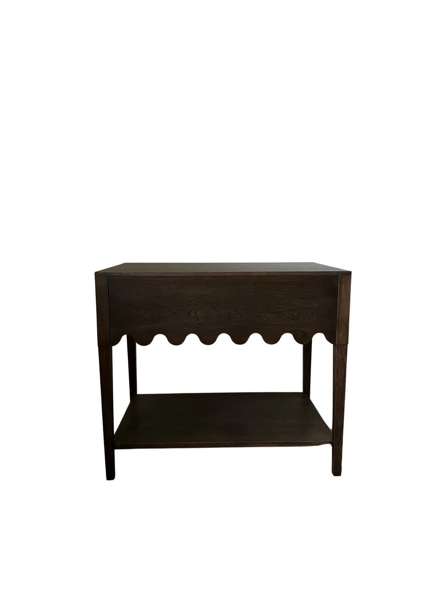 Hand-crafted with the highest quality of wood and designed with a scalloped drawer, the Charli Nightstand gives bespoke joinery a whole new meaning. This piece is delightfully versatile with a timeless quality we love. We designed this heirloom