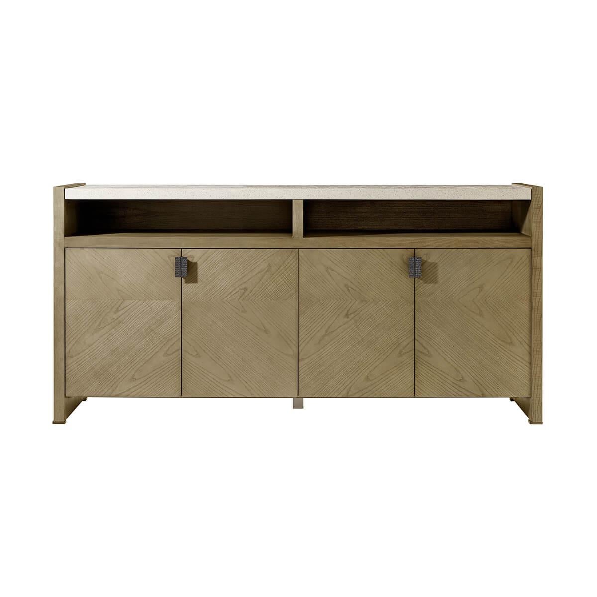 a minimalist four-door sideboard with peaceful symmetry in figured cathedral ash in our light Dune finish, with metal pulls in Ember completed with a top done in our stone-like porous Mineral finish. 
With two open shelves and two adjustable shelves