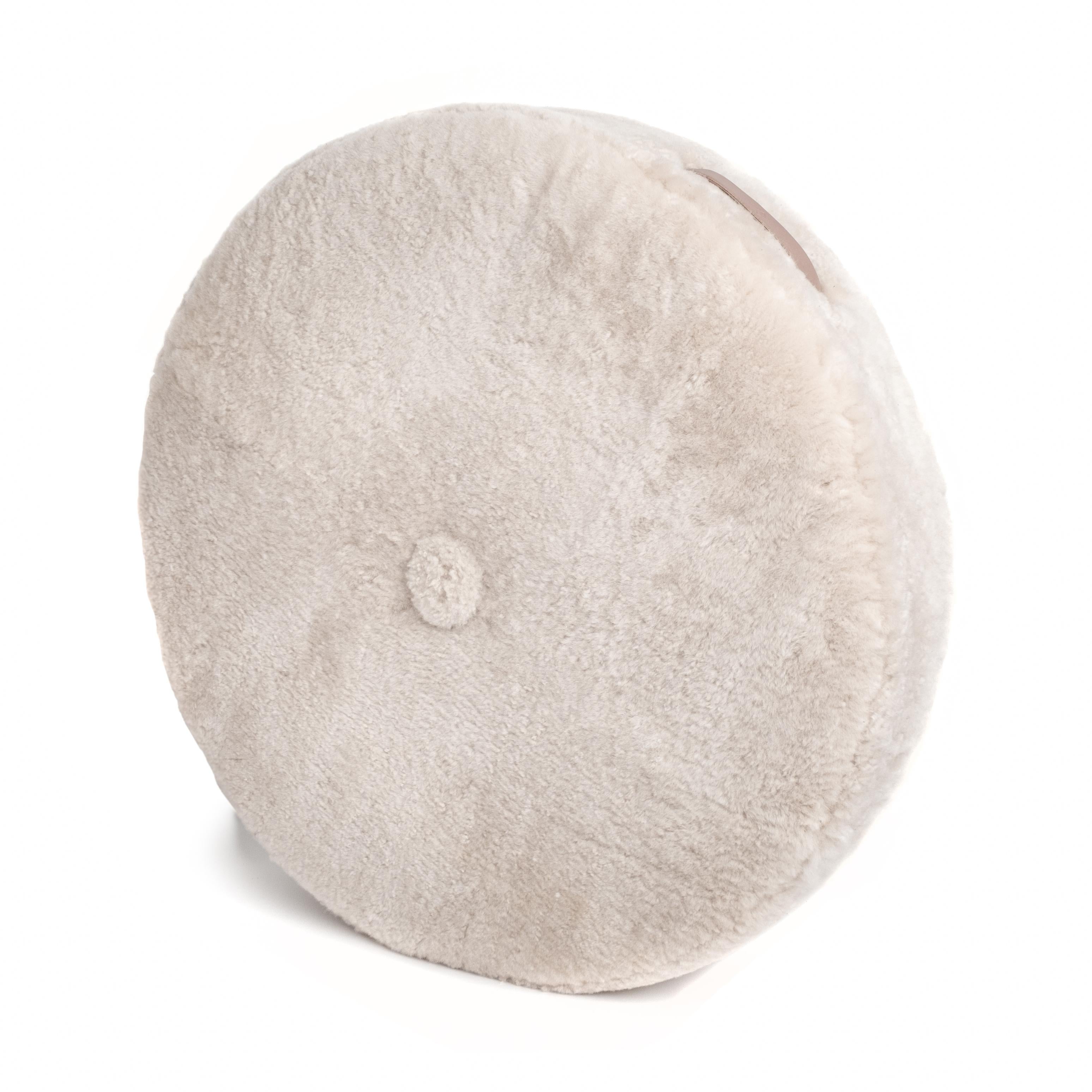 Designed to exude luxury and wake up your space with additional seating, accent decor and cozy chill zones, these low-profile circular shearling floor cushions can be easily moved or stashed away.  

Construction: Handcrafted to order in Long