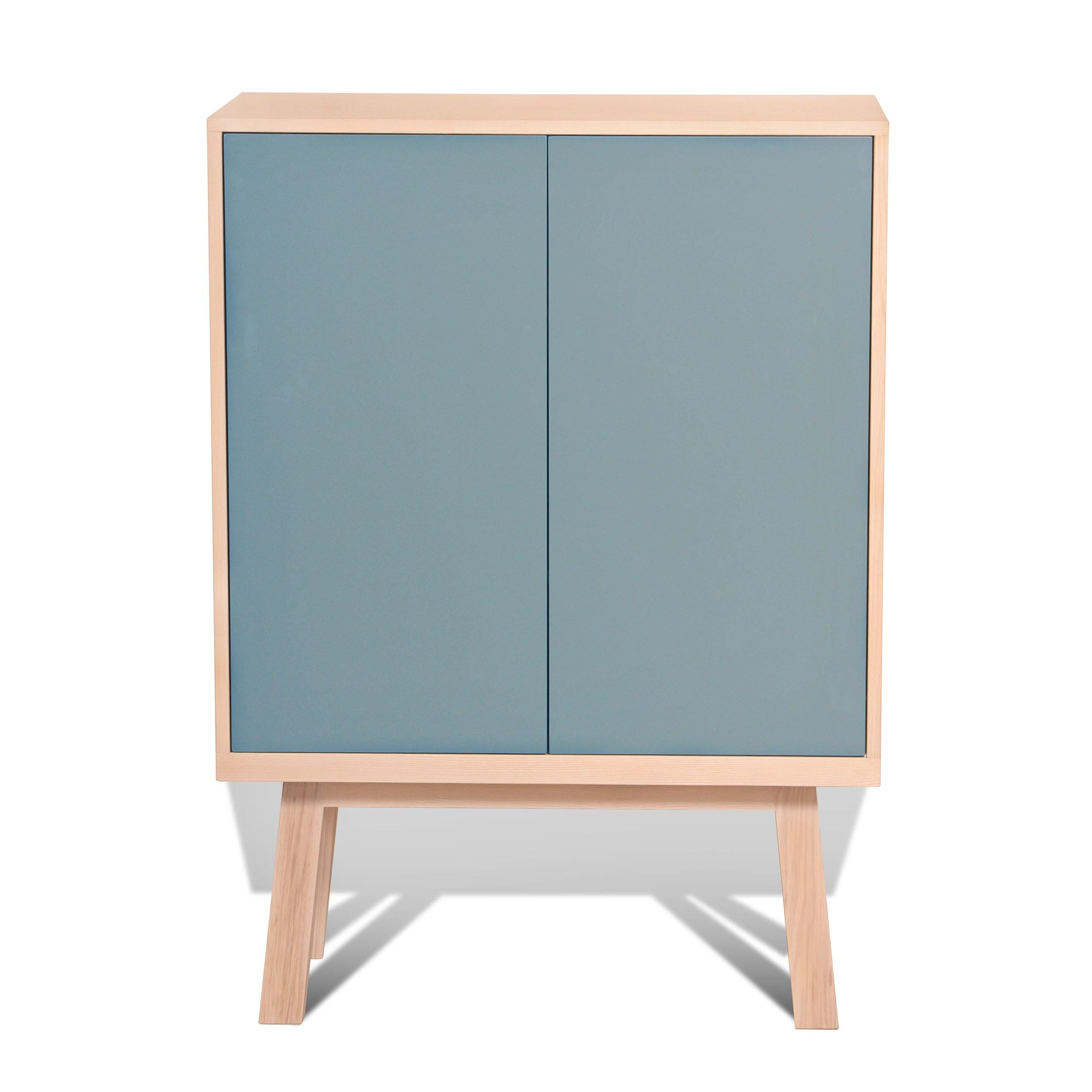 Shelf Cabinet designed by the parisian Designer Eric Gizard is equipped with 2 adjustable lacquered shelves and 2 doors with a push loose opening. 

The Kube itself (without the feet height) is width 90 cm / 35.4'' x height 90 cm / 35.4'' x depth