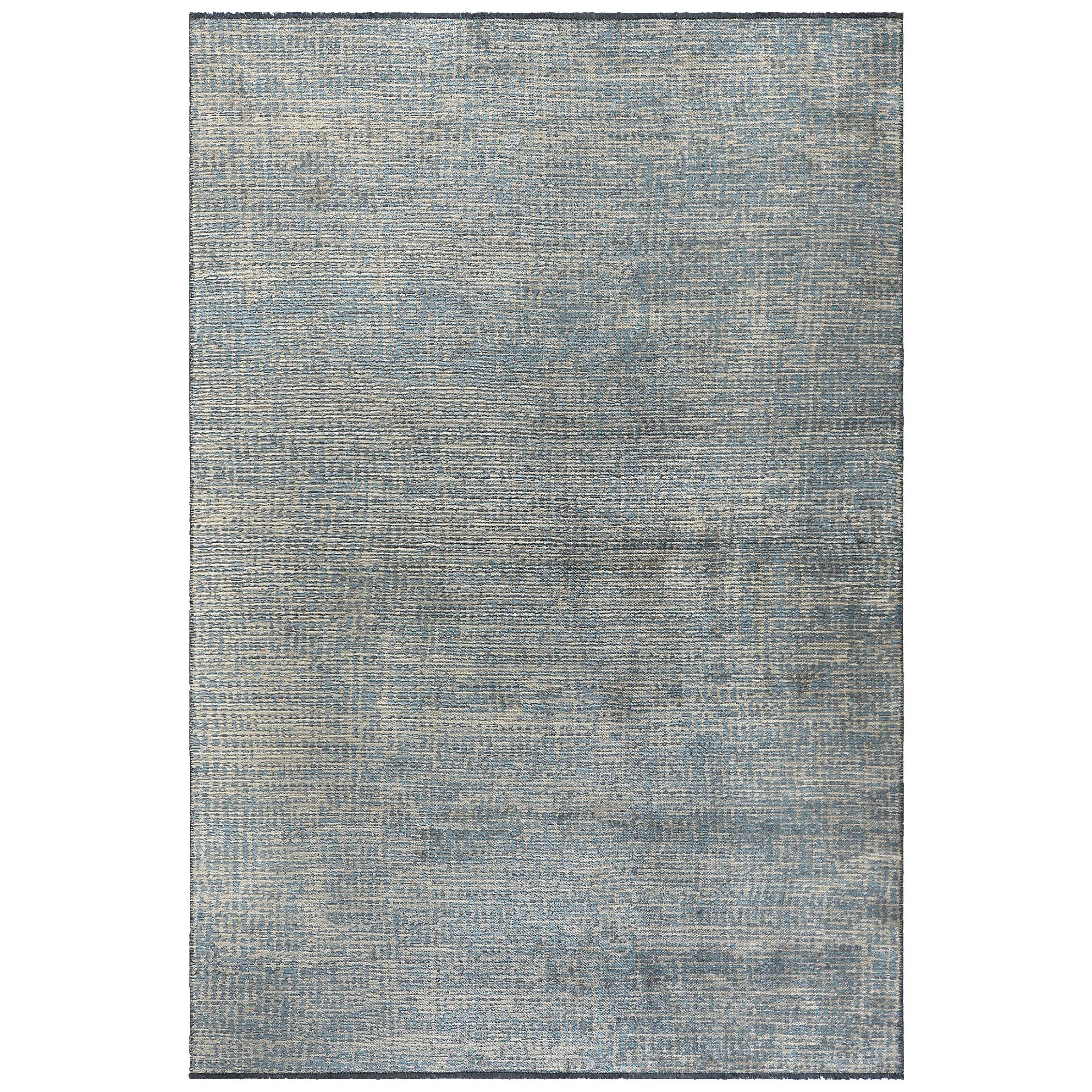Alfombra azul claro y gris plateado de rejilla ajustada con motivos geográficos abstractos y brillo