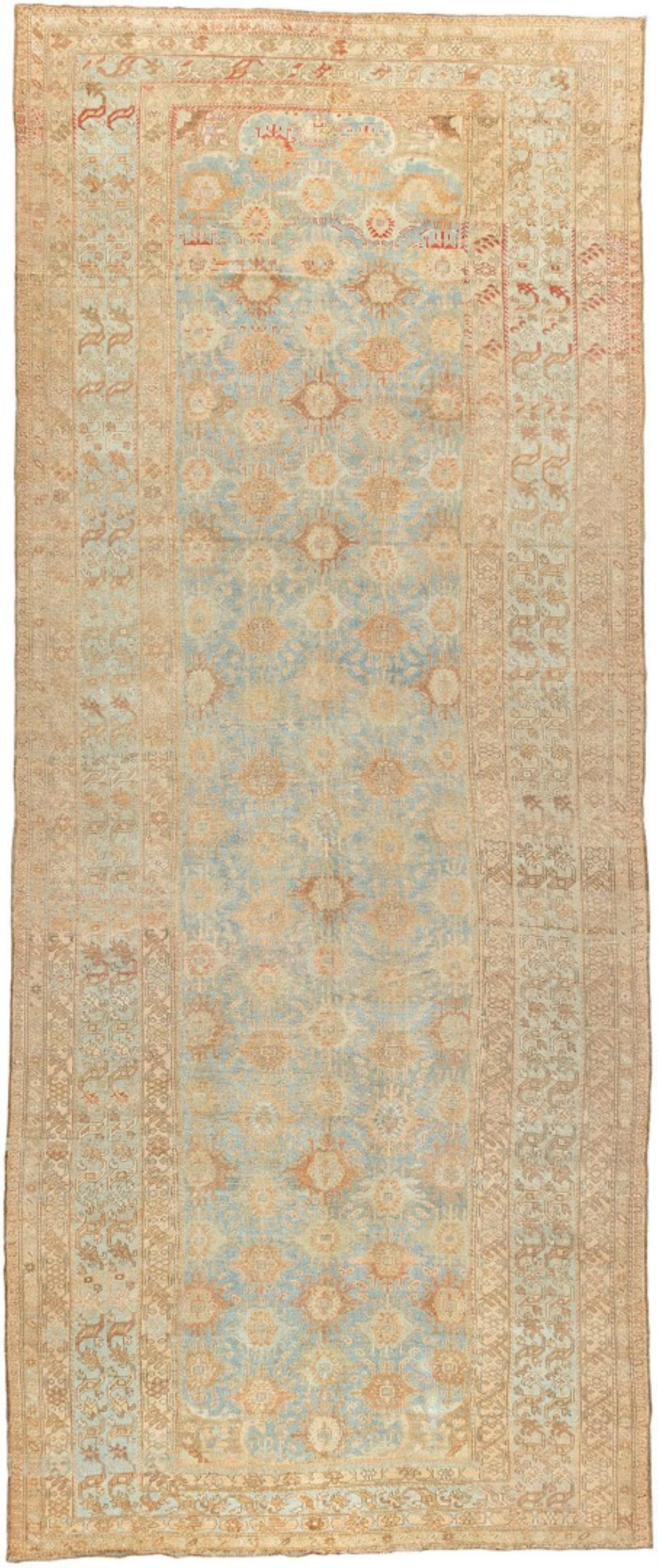 an early 20th Century Antique Malayer corridor size rug in light blue and sand tones

Measures: 8' x 19'4