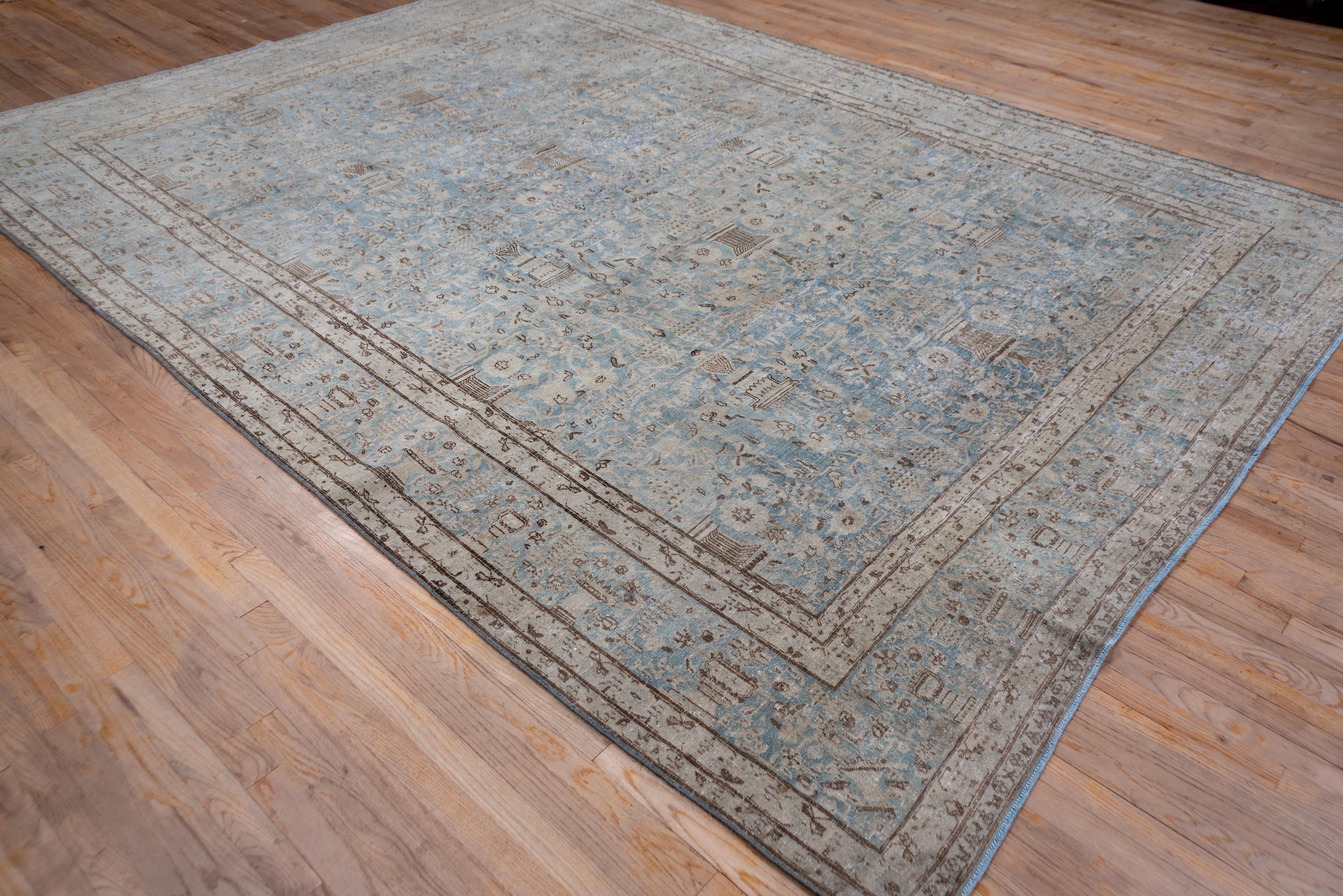 All vases, in the light blue field and in the lighter blue border, with flowers sprouting to fill every crevice. Dark chocolate details on this well-woven SE Persian city carpet.