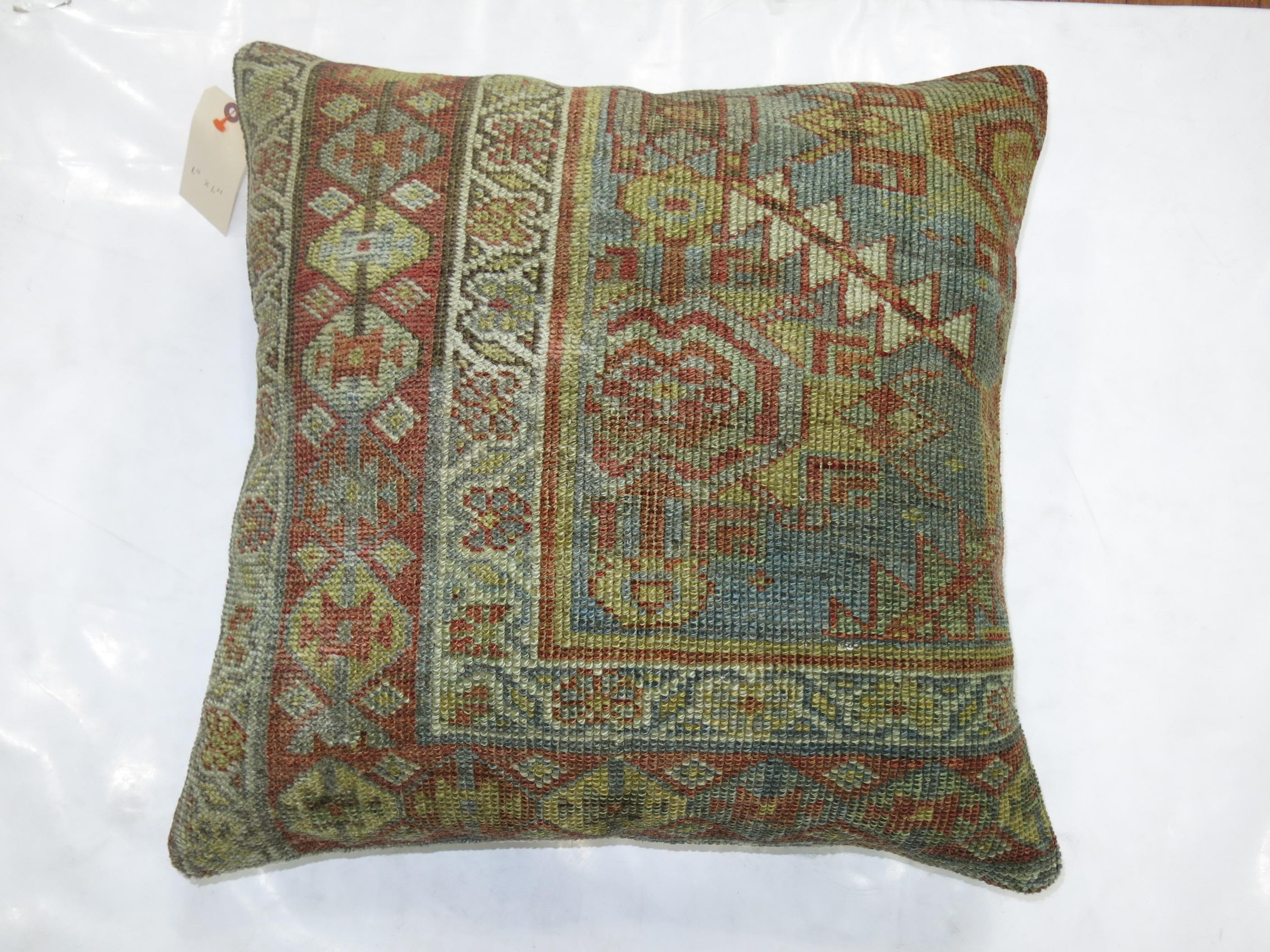 Pillow made from a Persian Malayer rug light blue and rust accents.

Measures: 23