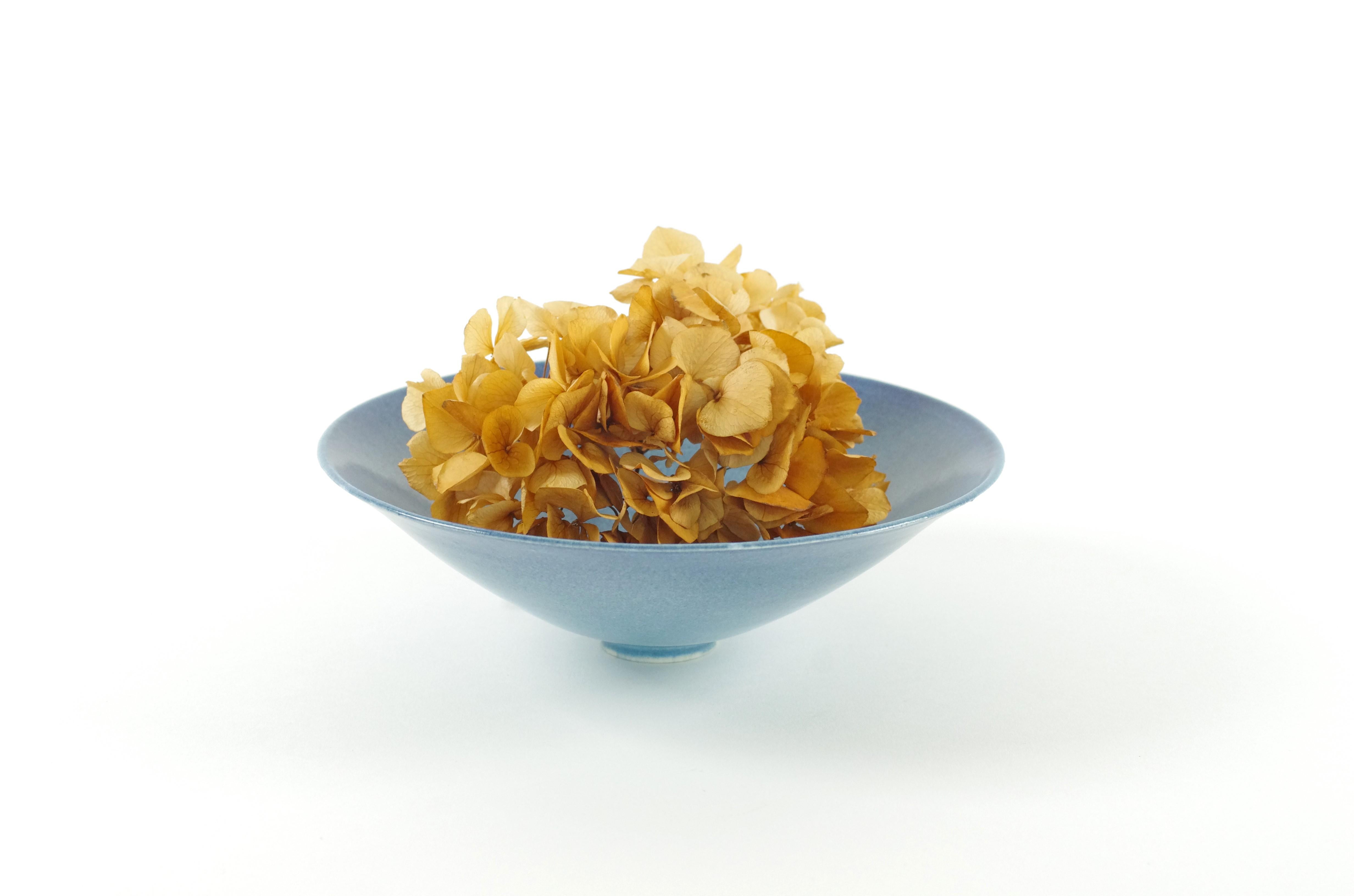Product description:
This is a beautiful flared bowl with sea-like patina by Otto Zeegers. Otto and his wife Margreet made ceramics sinds 1972, Otto was responsible for the form, the patina was created by Margreet. The patina is created in several