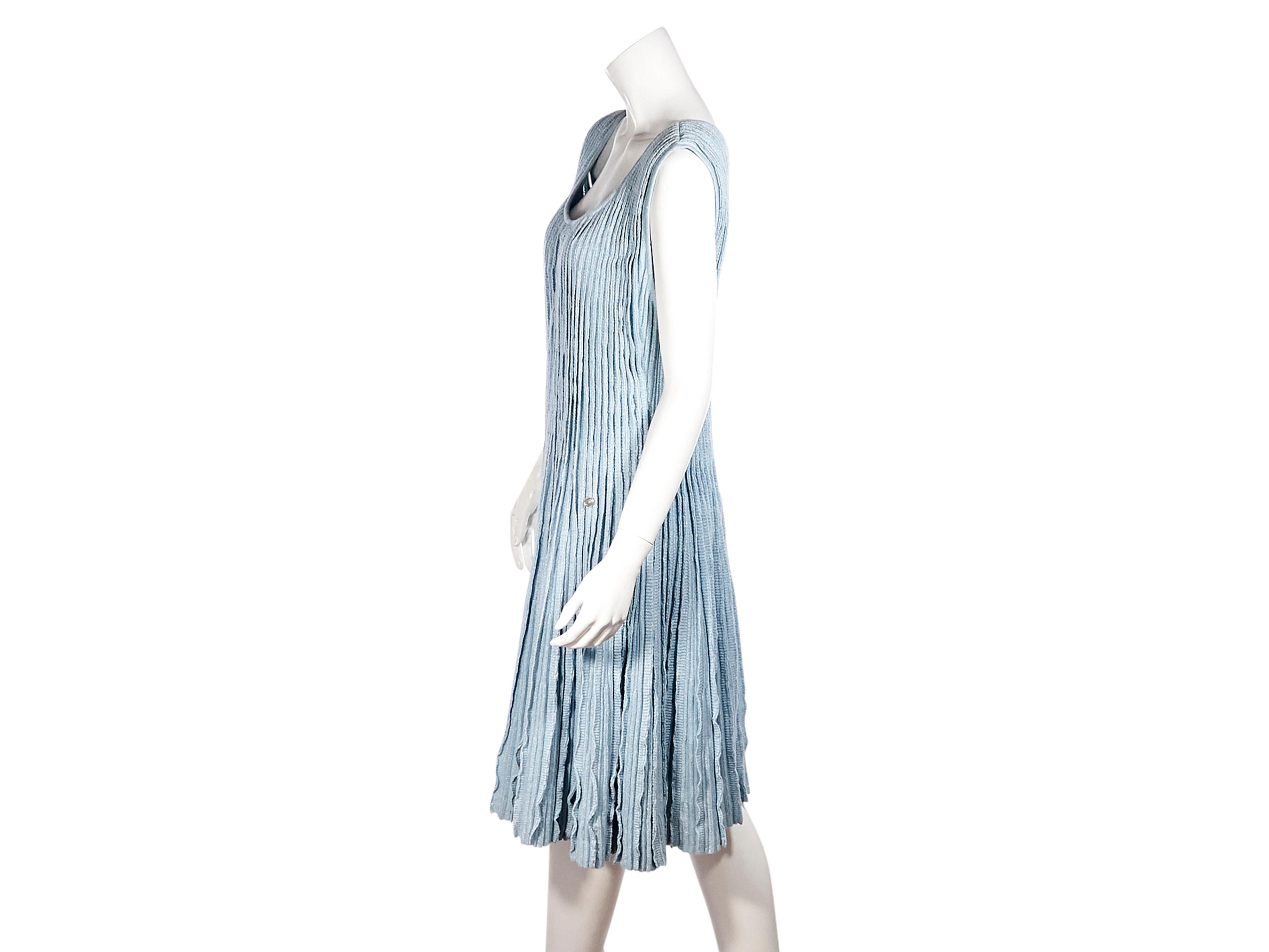 Product details:  Light blue cashmere/linen-blend knit tank dress by Chanel.  Deep scoopneck.  Sleeveless.  Pullover style.  36
