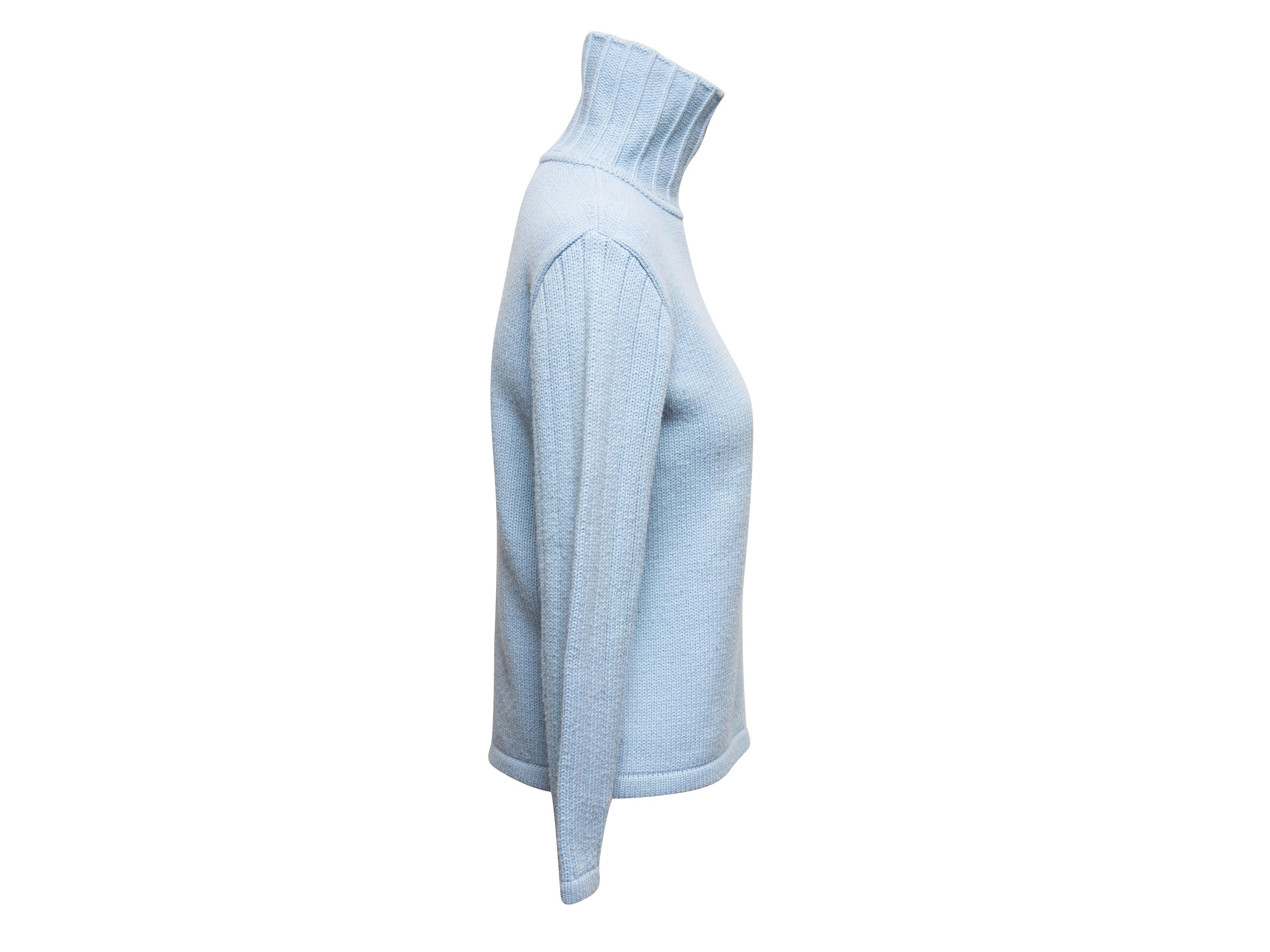 Maglione dolcevita in misto lana azzurro di Courreges. Maniche lunghe. Busto 37