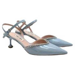 Light blue crystal embellished v-cut slingbacks