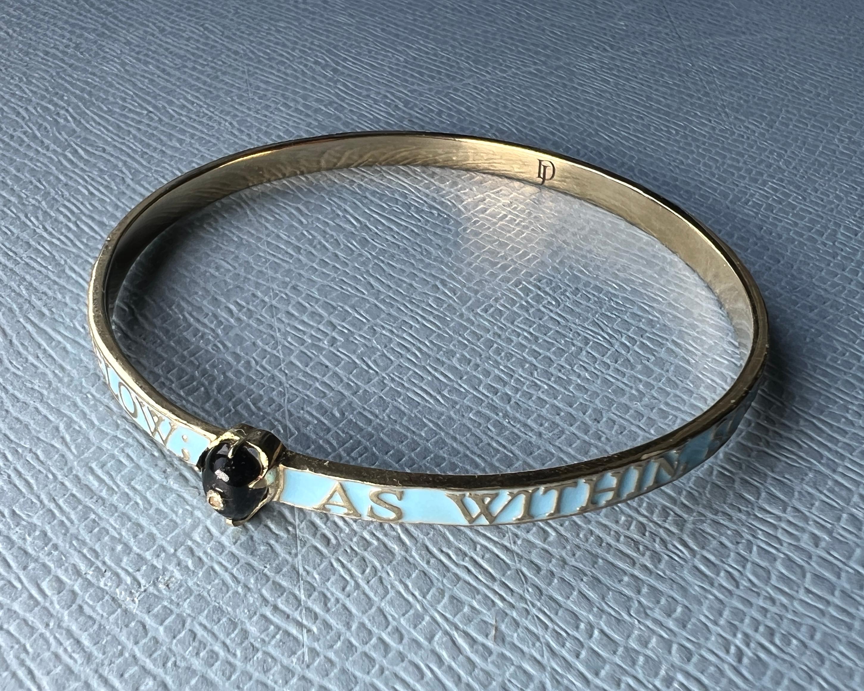 Light Blue Enamel Bangle Bracelet Diamond Onyx Heart 14K Gold-Plate

This J DAUPHIN bangle features a light blue finish over 14K gold-plated brass. The bangle is set with black onyx and diamond gemstones. A unique piece from J DAUPHIN for those