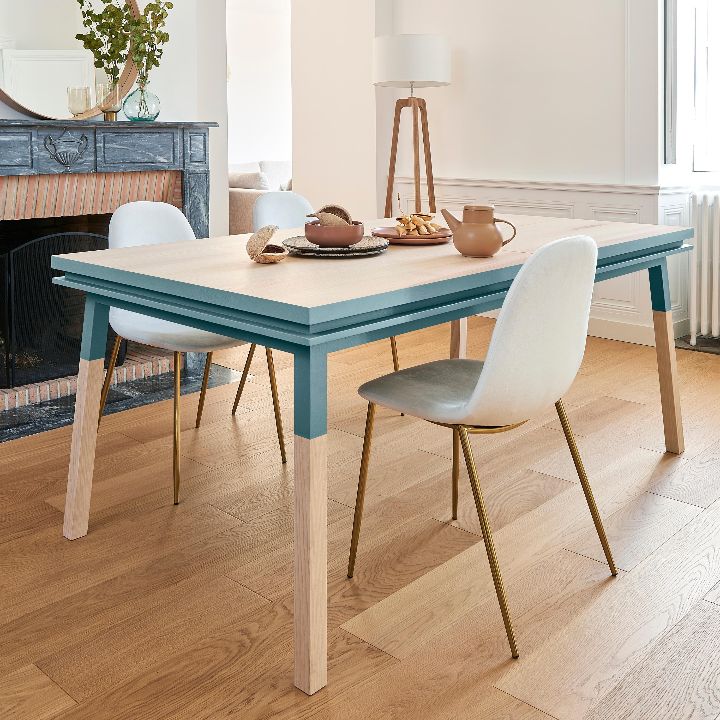 This rectangular dining table is proposed with 2 integrated and foldex extensions. 

It is made of 100% solid ash wood from sustainably managed and PEFC certified French forests.

The 3 lengths are 220 cm / 86.6 in when the table is closed, 260 cm /