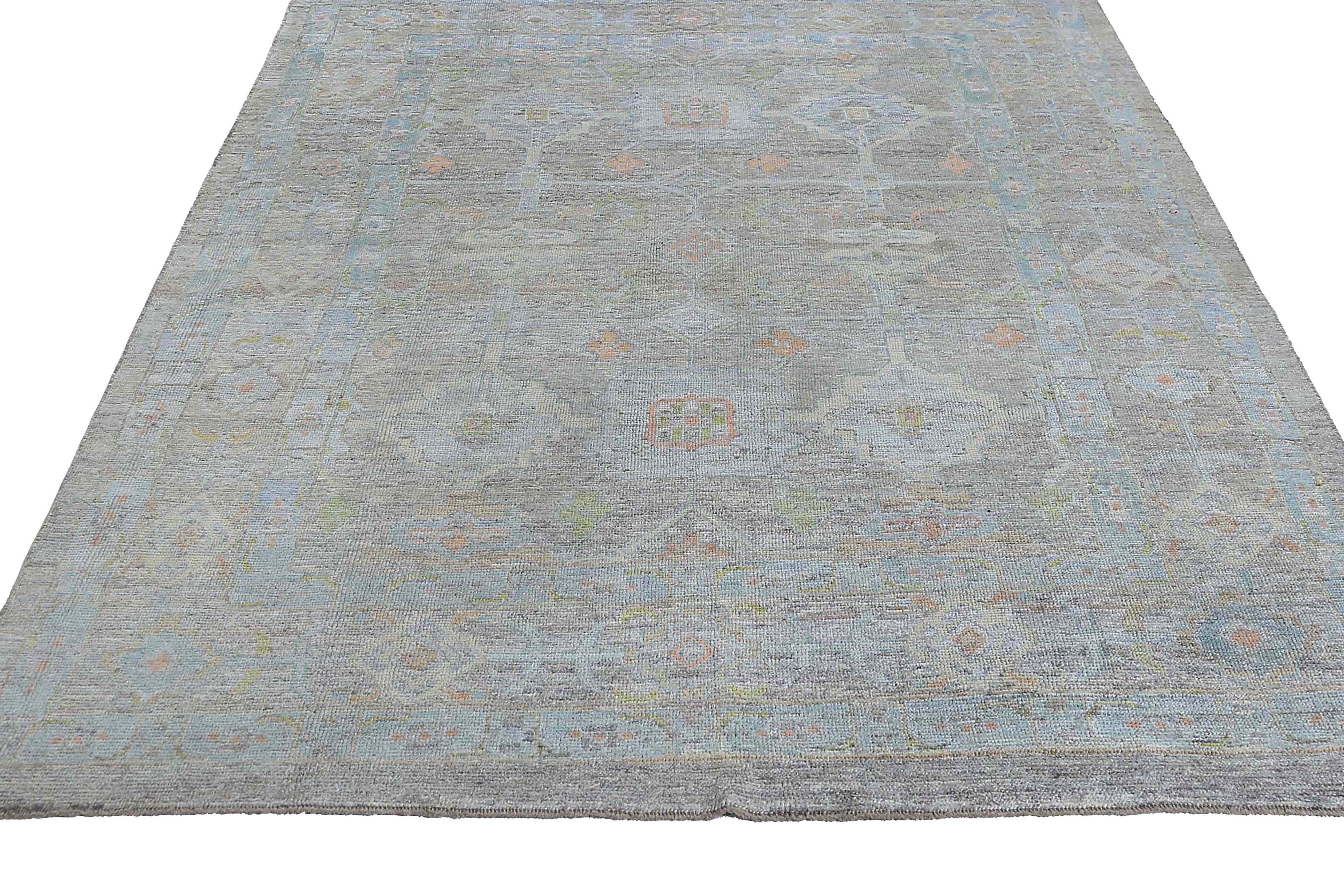 Introducing our beautiful Turkish Oushak rug in a stunning size of 8'6'' x 11'6'' that is sure to add a touch of elegance to any room. Crafted in the tradition of the Oushak region in Turkey, this rug features a classic design with a modern twist,