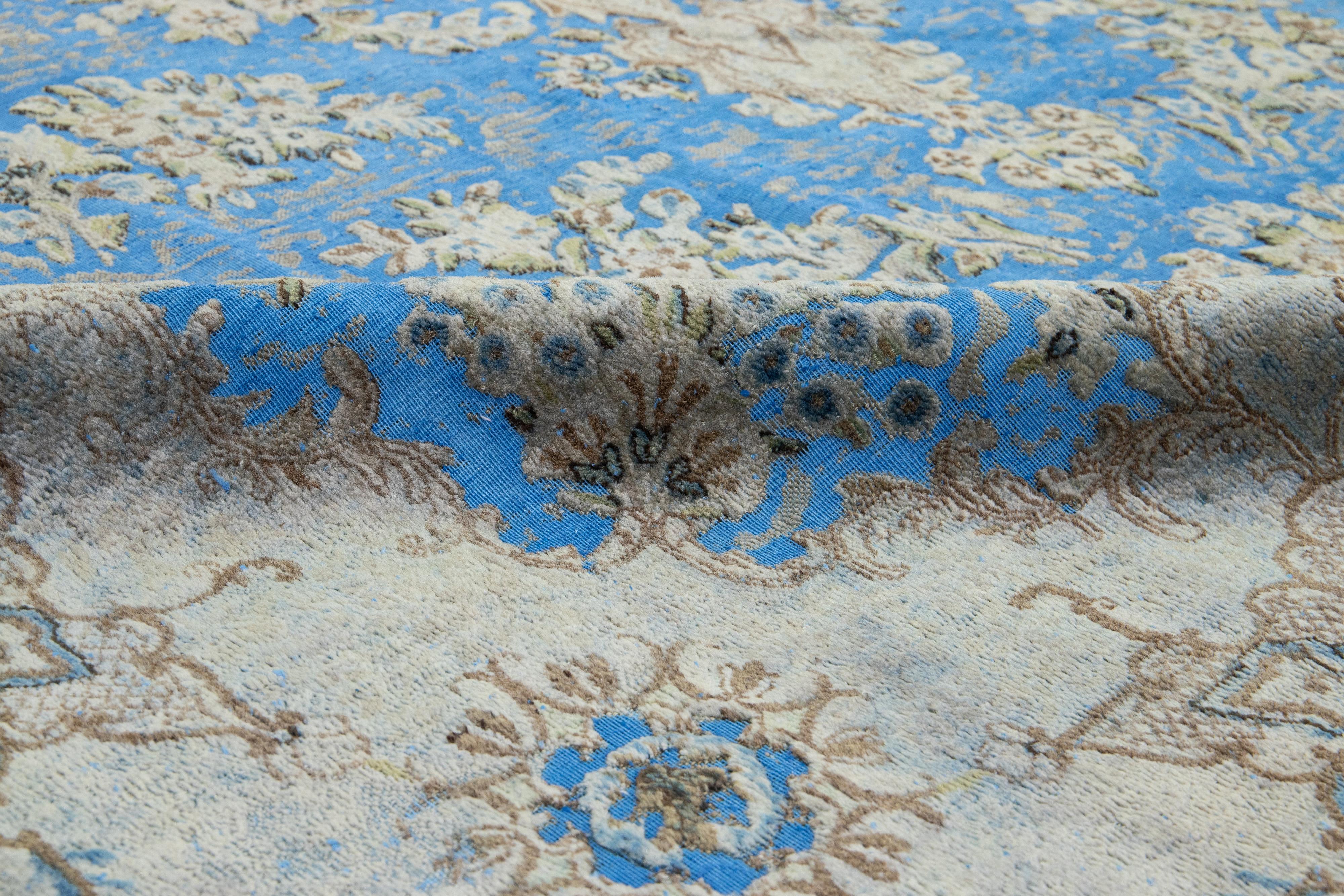 Hand-Knotted light Blue Floral Antique Persian Overdyed Wool Rug With Medallion Motif For Sale