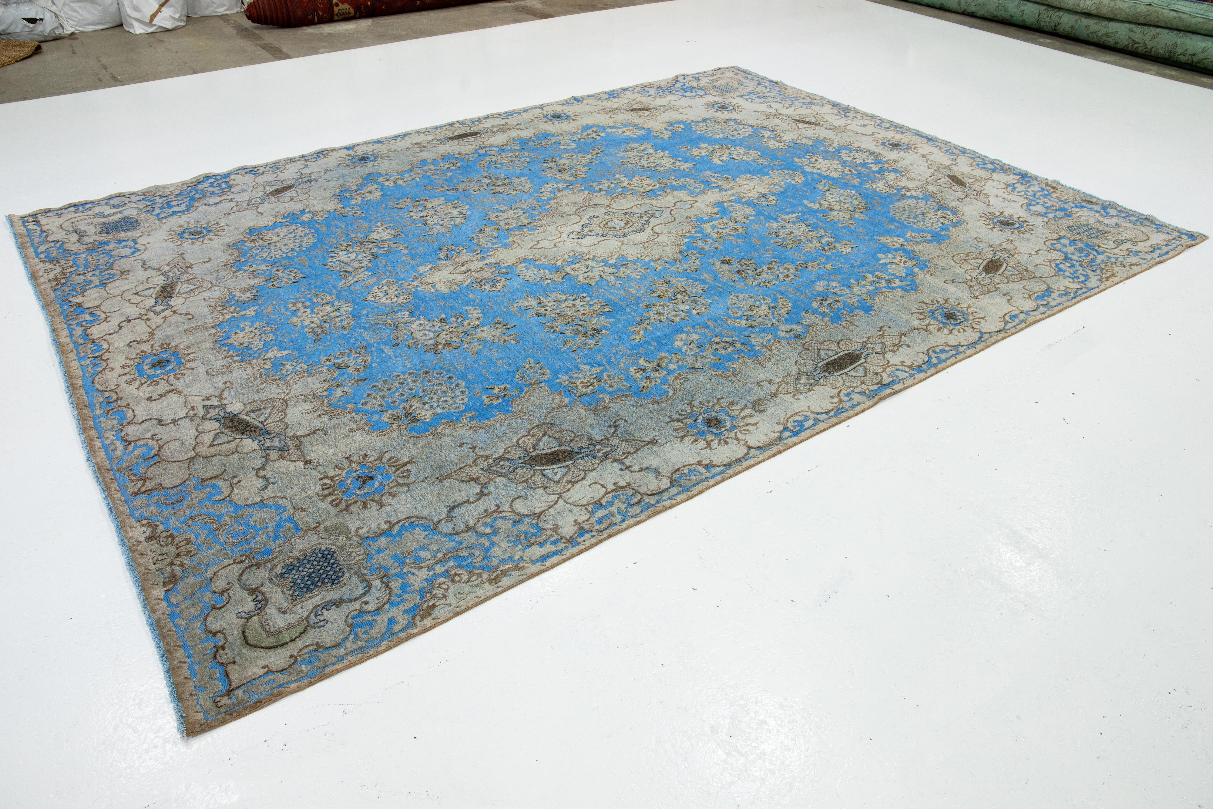 light Blue Floral Antique Persian Overdyed Wool Rug With Medallion Motif In Good Condition For Sale In Norwalk, CT
