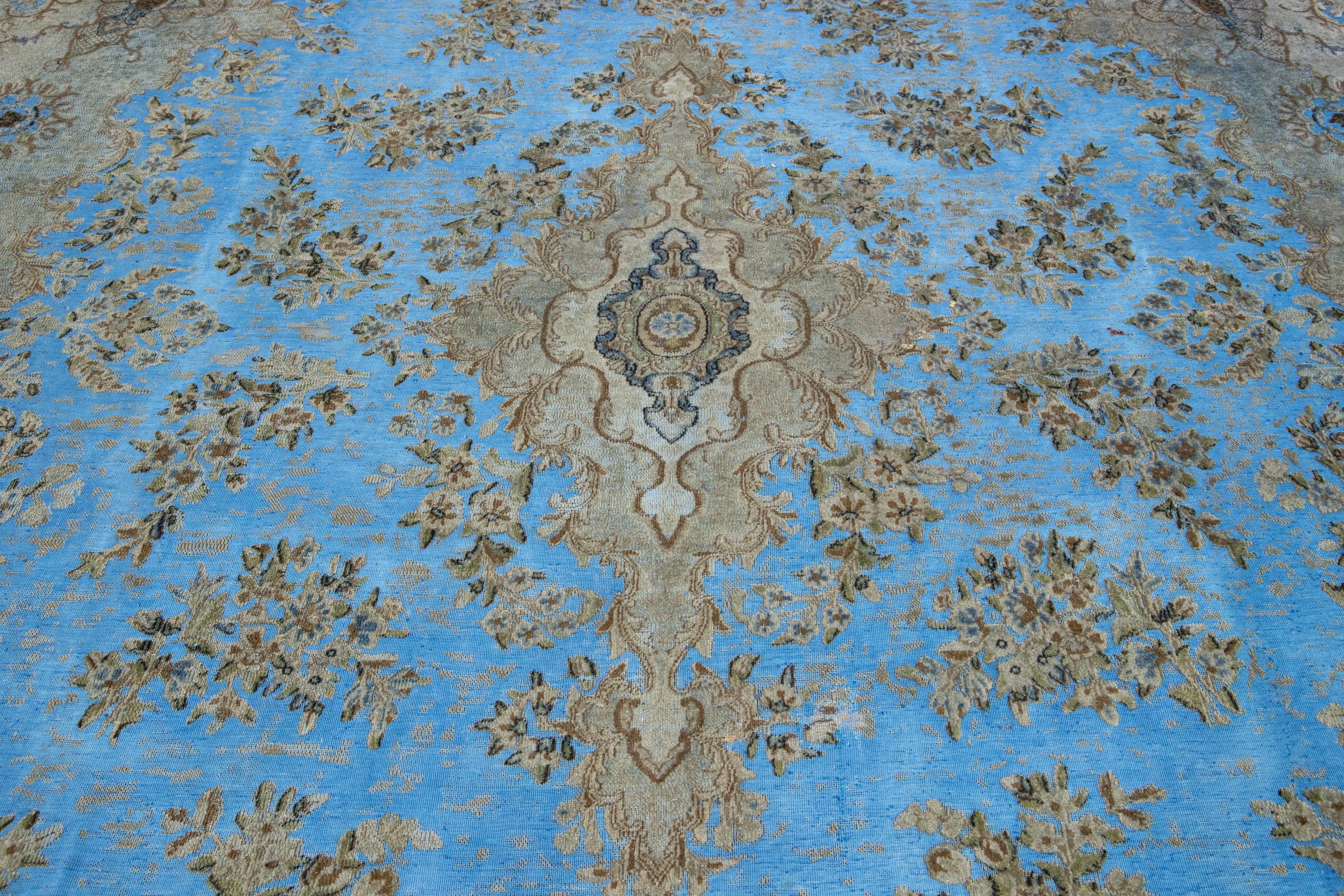 light Blue Floral Antique Persian Overdyed Wool Rug With Medallion Motif For Sale 1
