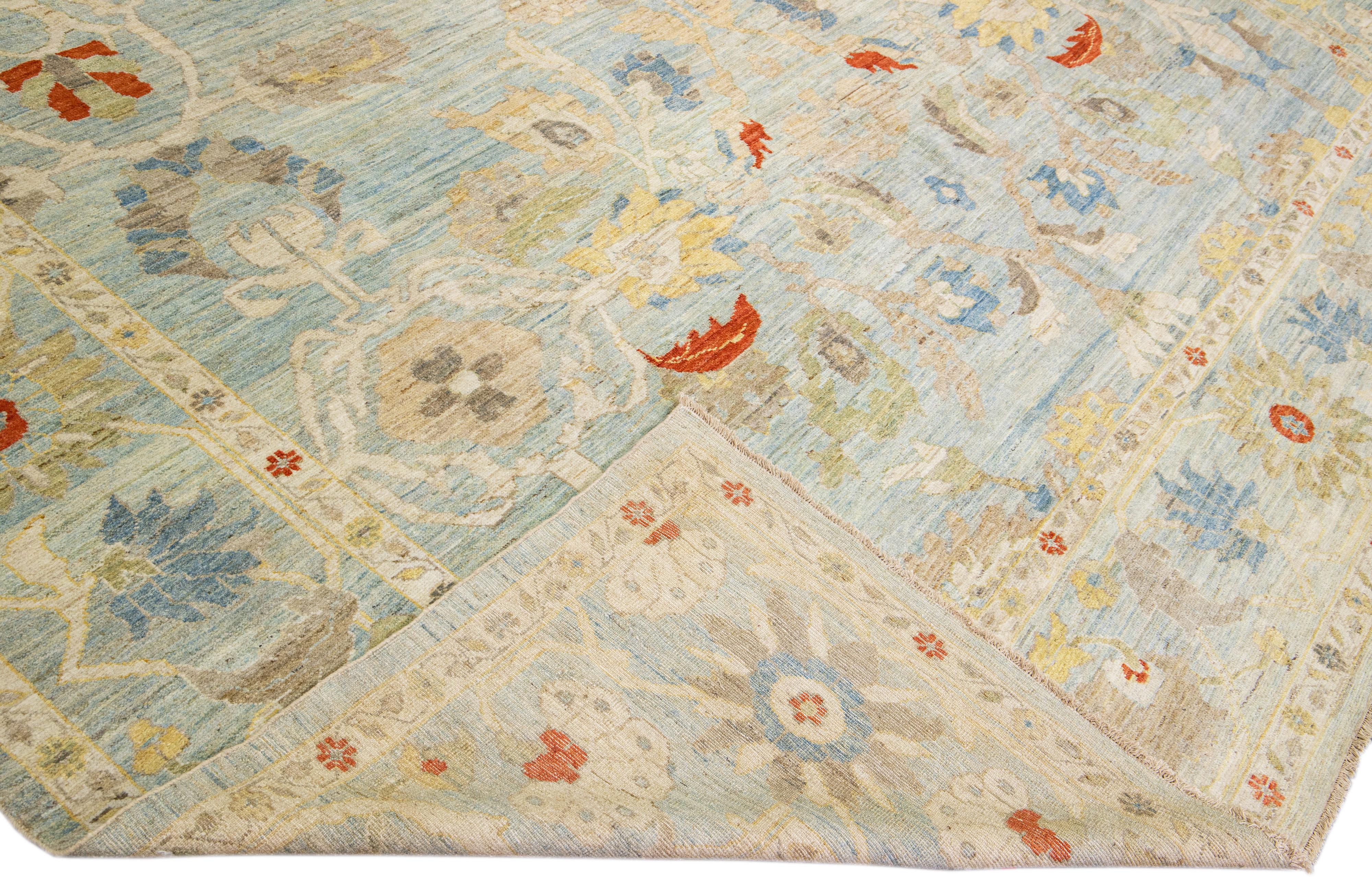 Beautiful modern Sultanabad hand-knotted wool rug with a light blue field. This Sultanabad rug has multicolor accents in a gorgeous all-over classic floral pattern design.

This rug measures: 14
