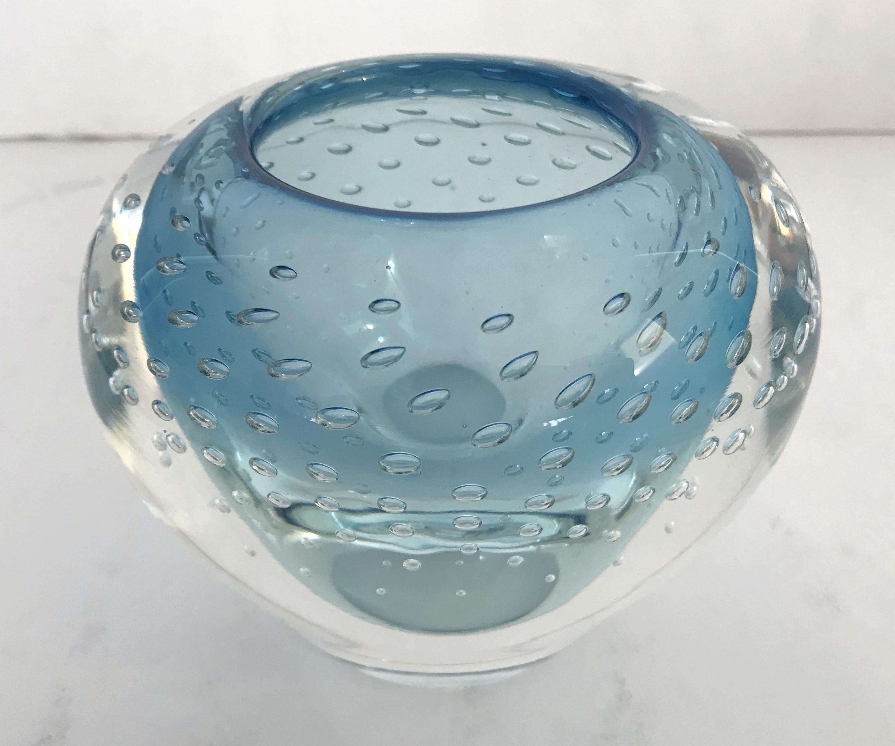 Vintage Italian light blue Murano glass bowl carefully hand blown with small bubbles inside the glass using pulegoso technique / Made in Italy, circa 1960s
Measures: width 5 inches, depth 4.25 inches, height 4 inches
1 in stock in Palm Springs ON