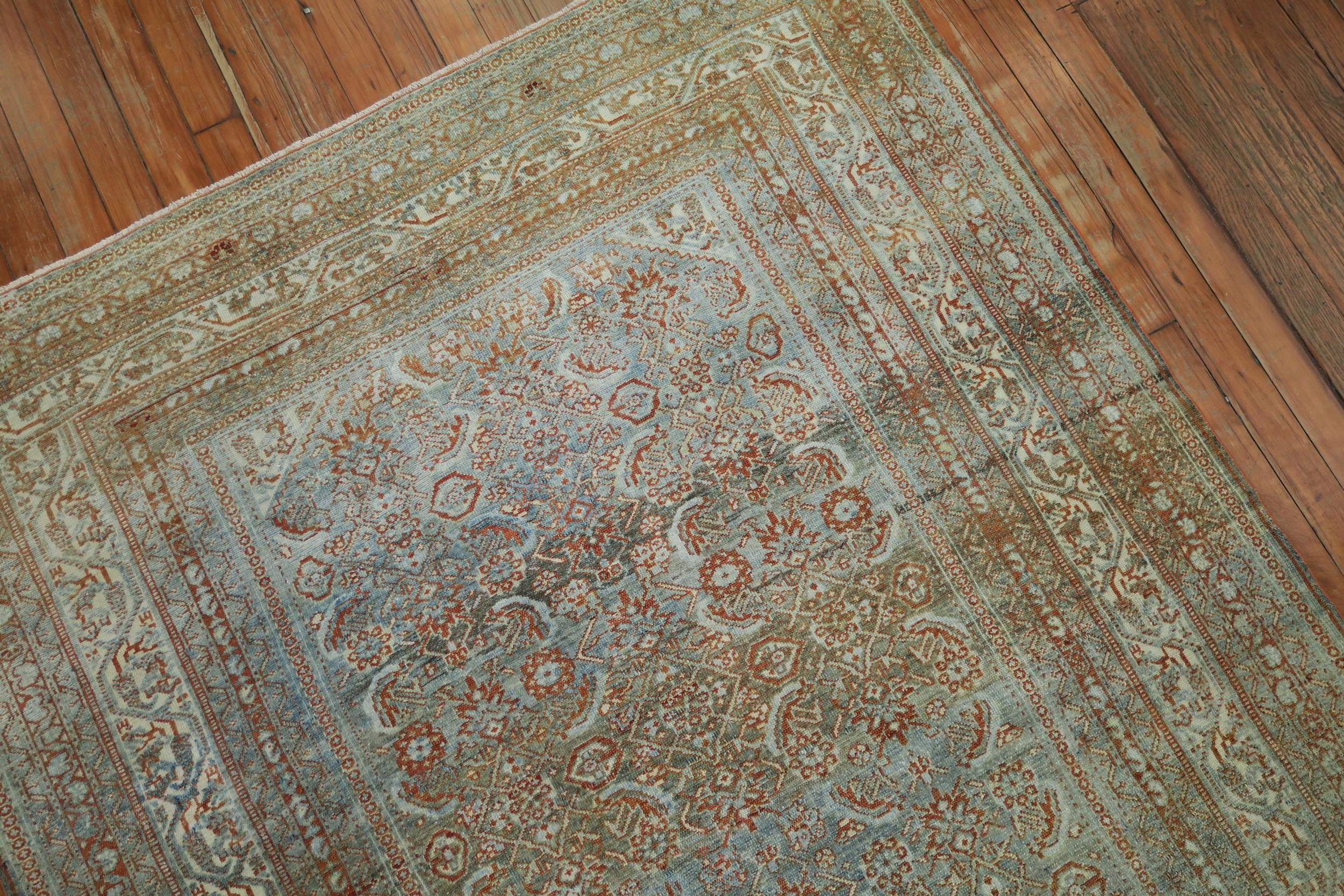 Lovely early 20th century Persian Malayer with a light blue field, accents in terracotta and brown circa 1910

Measures: 4'3” x 6'.

 