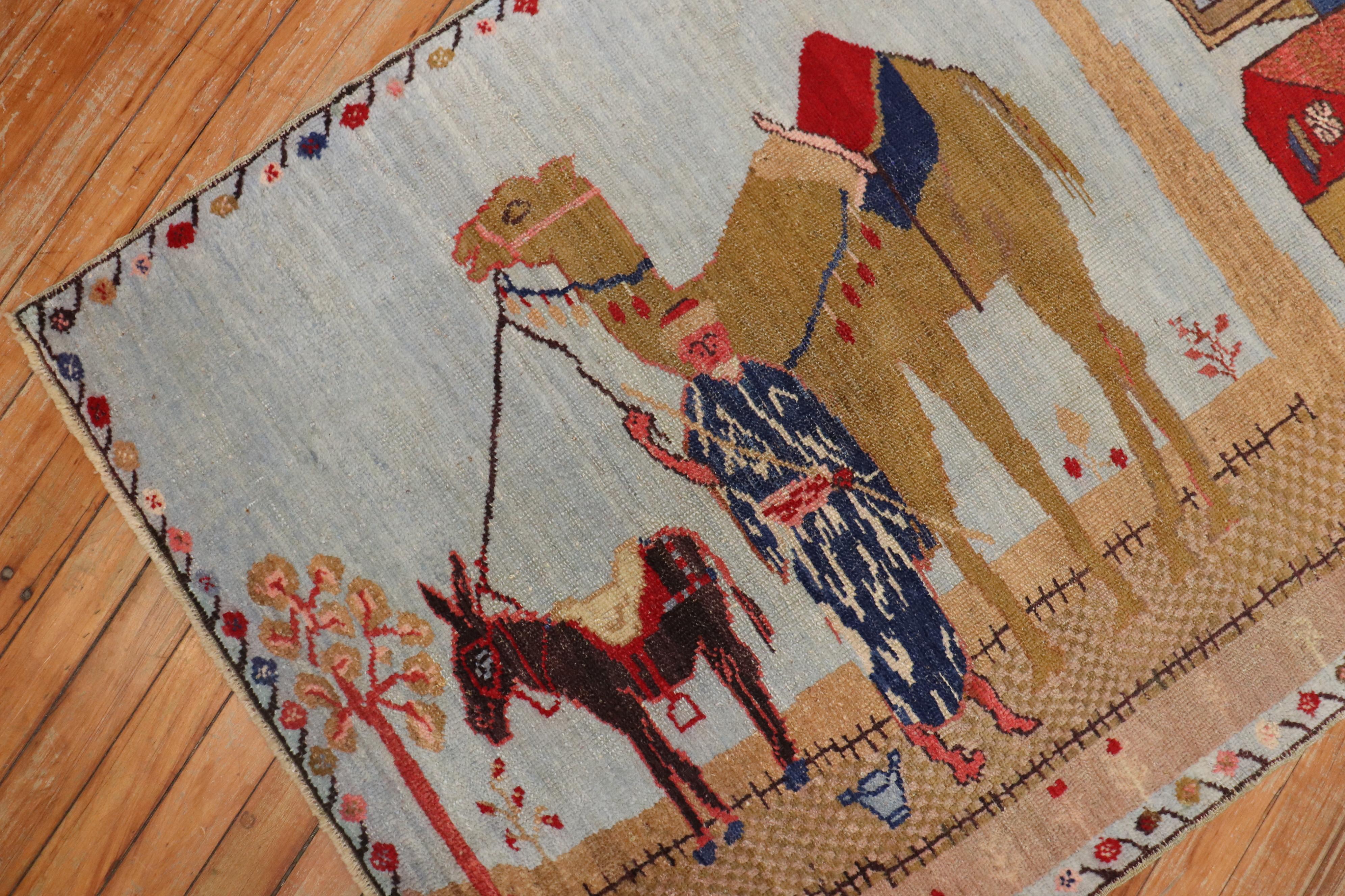 Mid-20th century Turkish pictorial rug woven in central turkey depicting a large camel and a small horse latched onto an older man with 2 trees and a house in the background

Size: 3' x 4'.