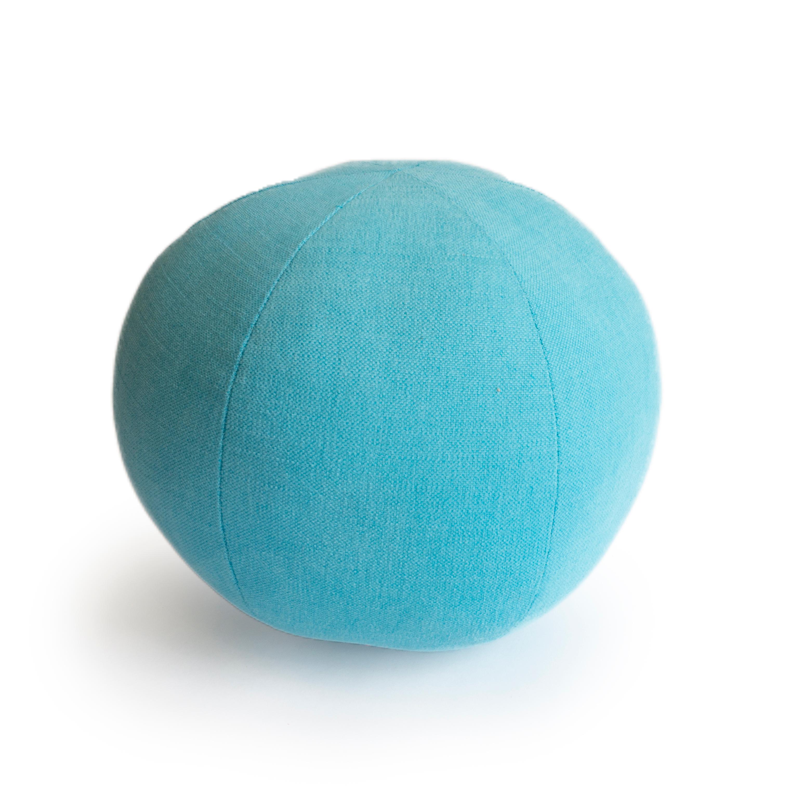 This hand sewn round ball throw pillow was handmade in a light blue cotton fabric. All pillows are made at our studio in Norwalk, Connecticut. 

Measurements: 9