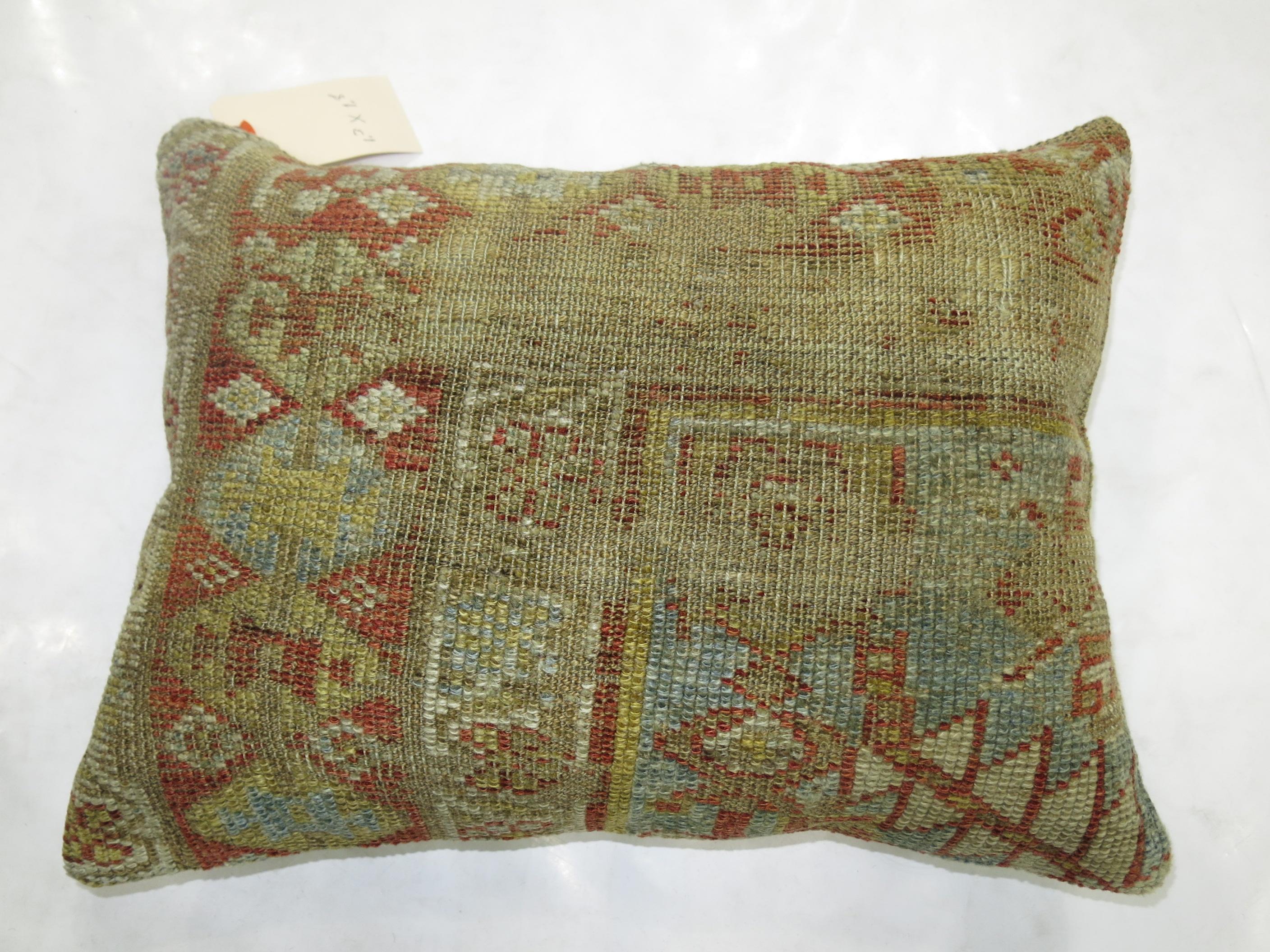 Pillow made from a Persian Malayer rug in dominant light blue and rust accents.

Measures: 15