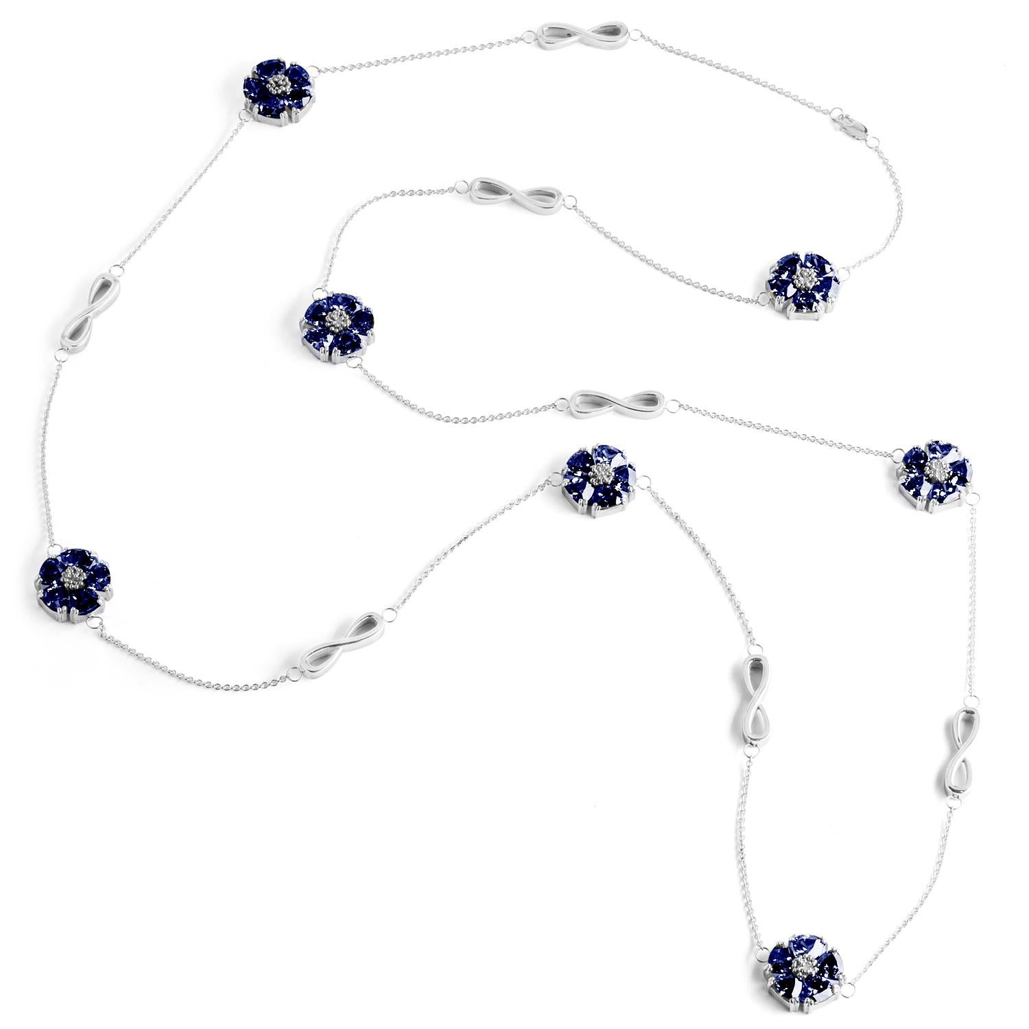 Designed in NYC

.925 Sterling Silver 15 x 7 mm Light Blue Sapphire Blossom Stone and Infinity Lariat Necklace. No matter the season, allow natural beauty to surround you wherever you go. Blossom stone and infinity lariat necklace: 

Sterling silver