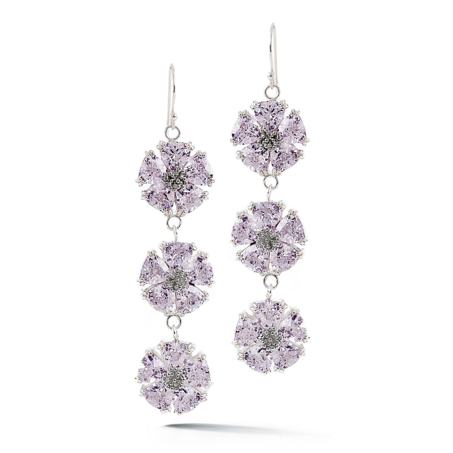 Designed in NYC

.925 Sterling Silver 30 x 7 mm Light Blue Sapphire Triple Stone Blossom Bling Earrings. No matter the season, allow natural beauty to surround you wherever you go. Triple blossom stone bling earrings: 

Sterling silver 
High-polish