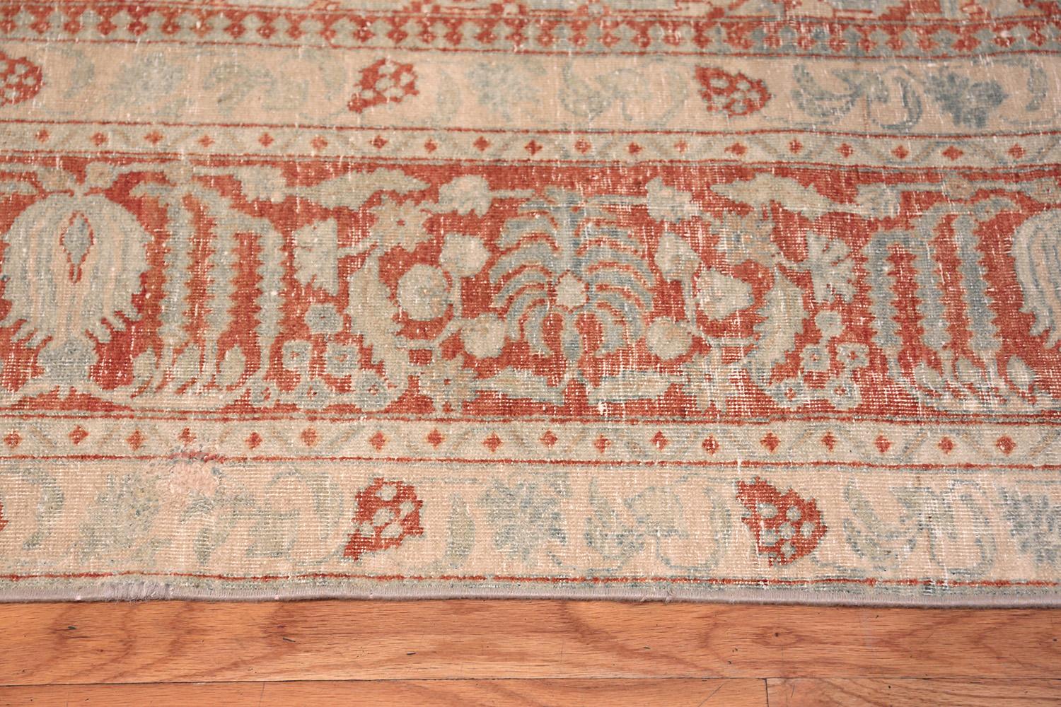 Light blue shabby chic antique Persian Tabriz rug, rug type / country of origin: antique Persian rugs, date circa 1920 - Size: 8 ft 4 in x 10 ft 7 in (2.54 m x 3.23 m). 

Tabriz is a city steeped in a rug weaving tradition that includes high