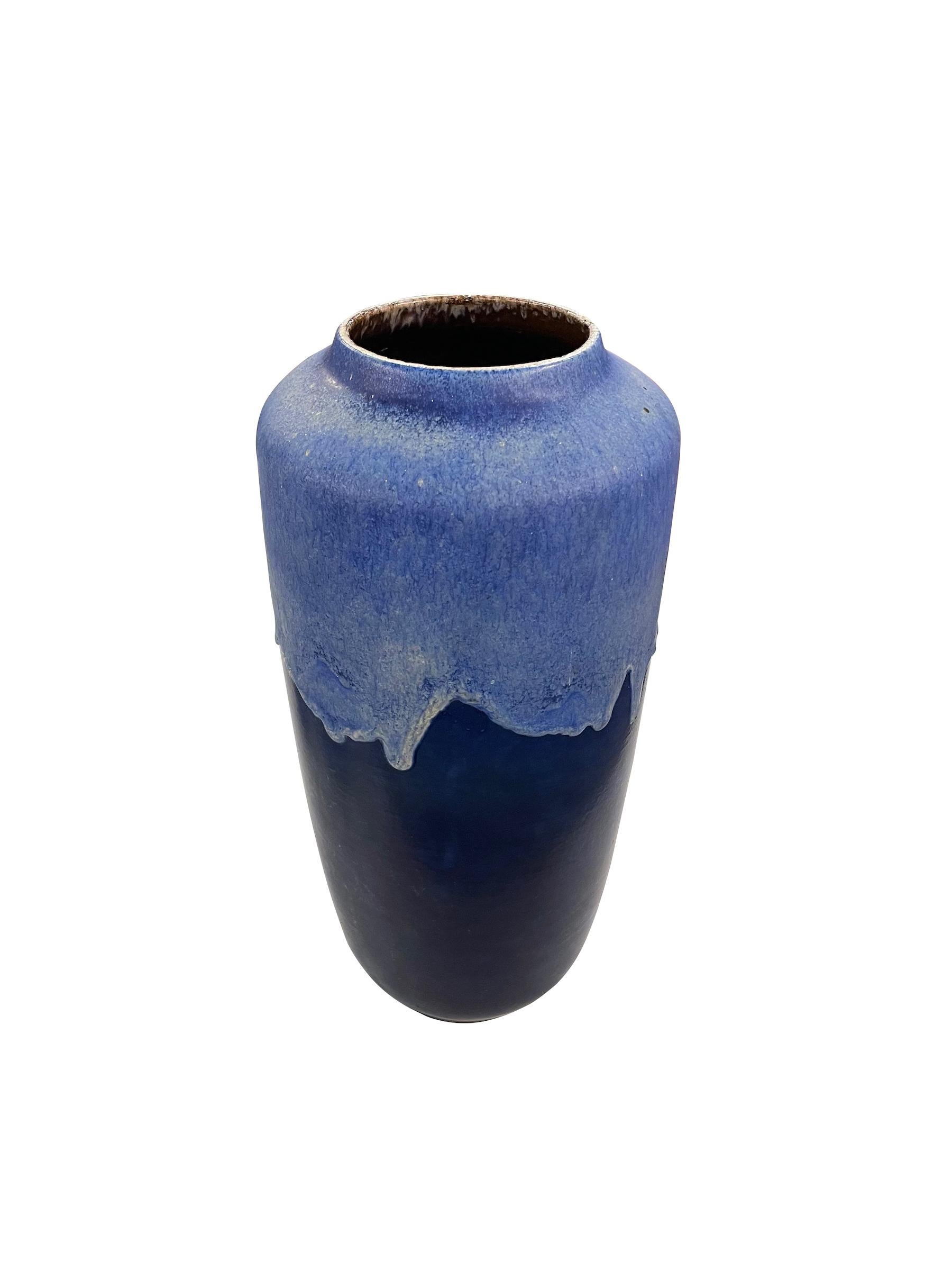 Mid Century German ceramic vase with light blue glazed top dripping to darker blue base.
Can hold water.
Sits nicely with S6757 and S6758.
ARRIVING APRIL