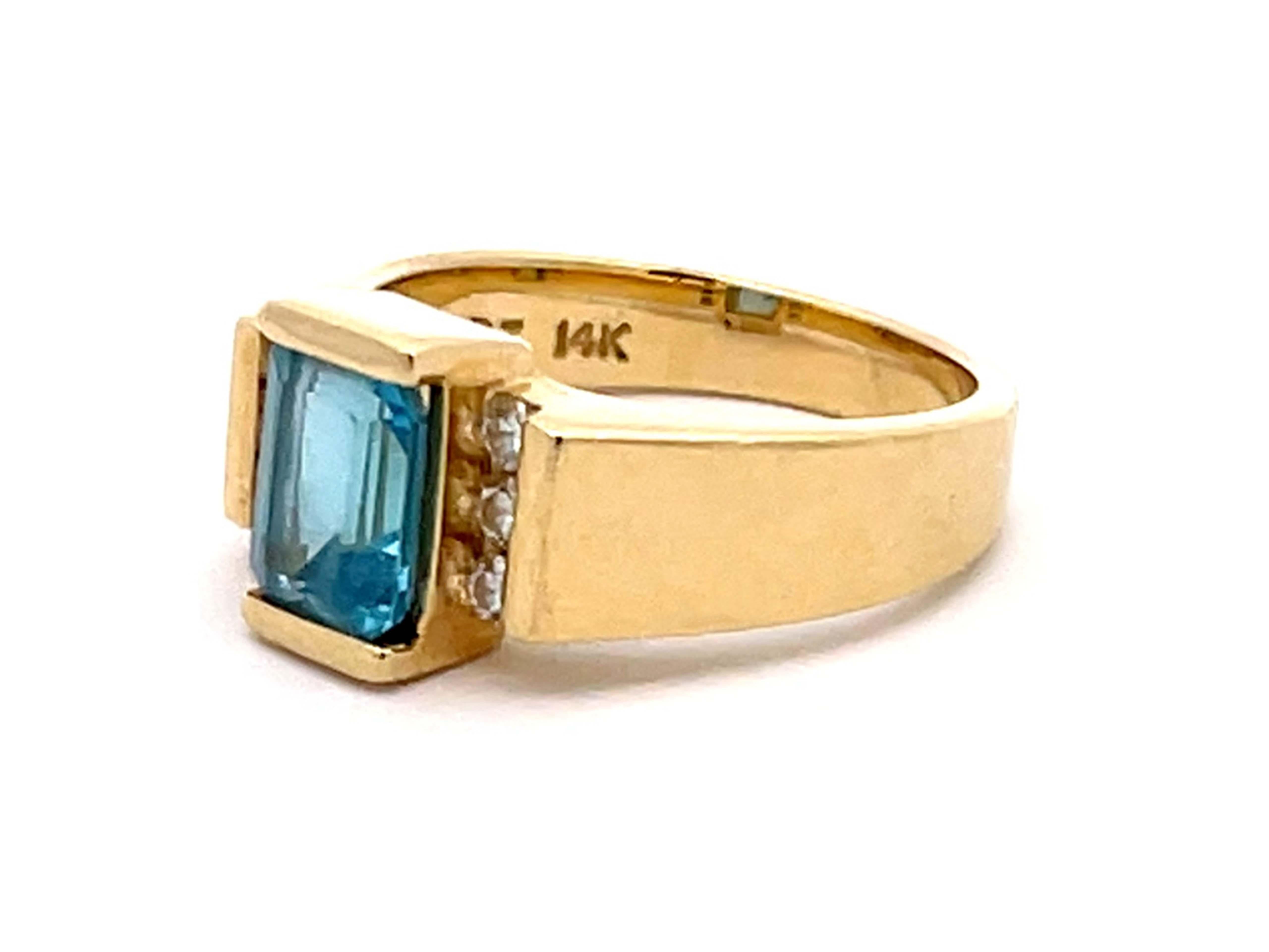 Modern Light Blue Topaz and Diamond Ring in 14k Yellow Gold For Sale