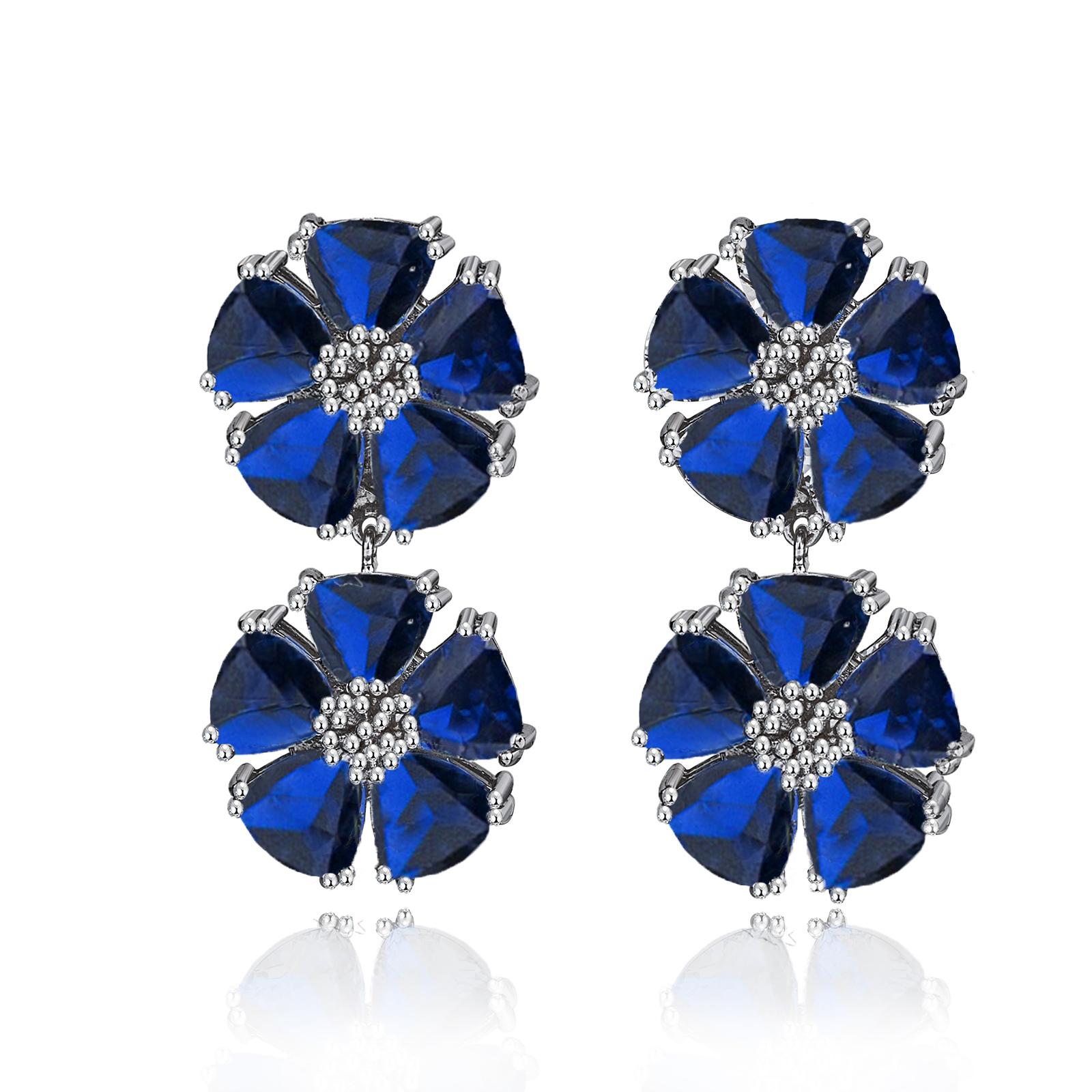 Designed in NYC

.925 Sterling Silver 2 x 20 mm Light Blue Topaz Double Blossom Stone Earrings. No matter the season, allow natural beauty to surround you wherever you go. Double blossom stone earrings: 

    Sterling silver 
    High-polish finish