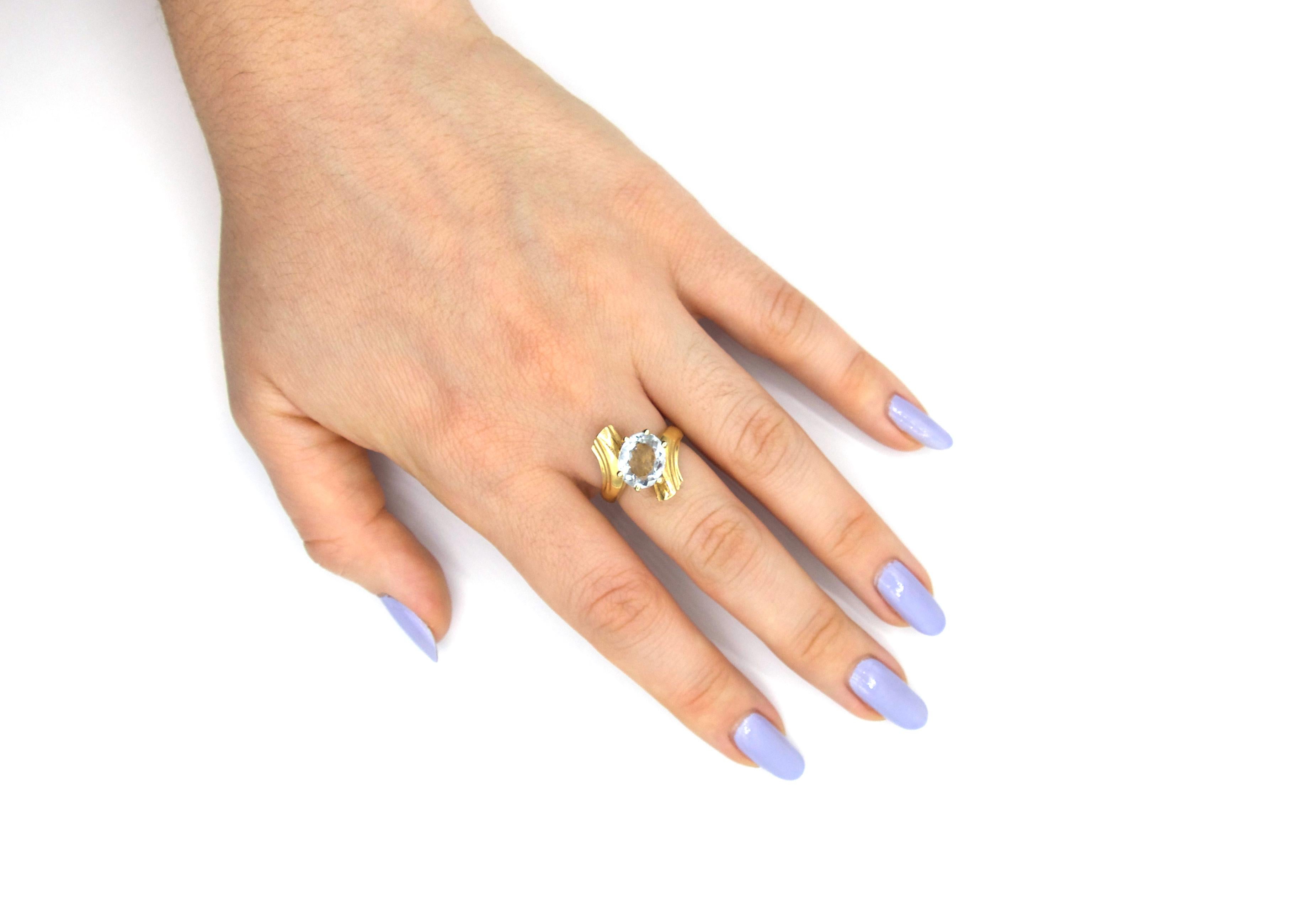 Modern Light Blue Topaz Twist Ring in 14K Gold For Sale