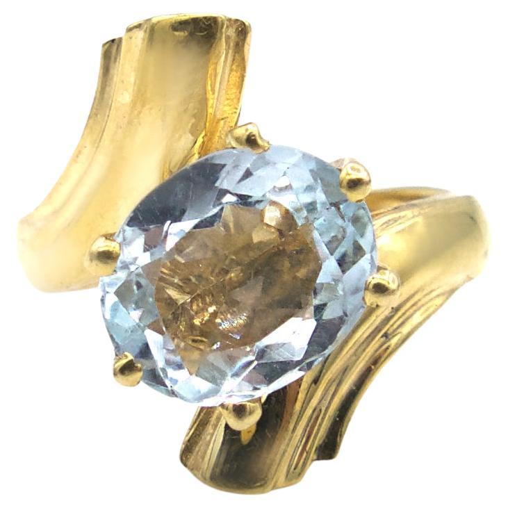 Light Blue Topaz Twist Ring in 14K Gold For Sale