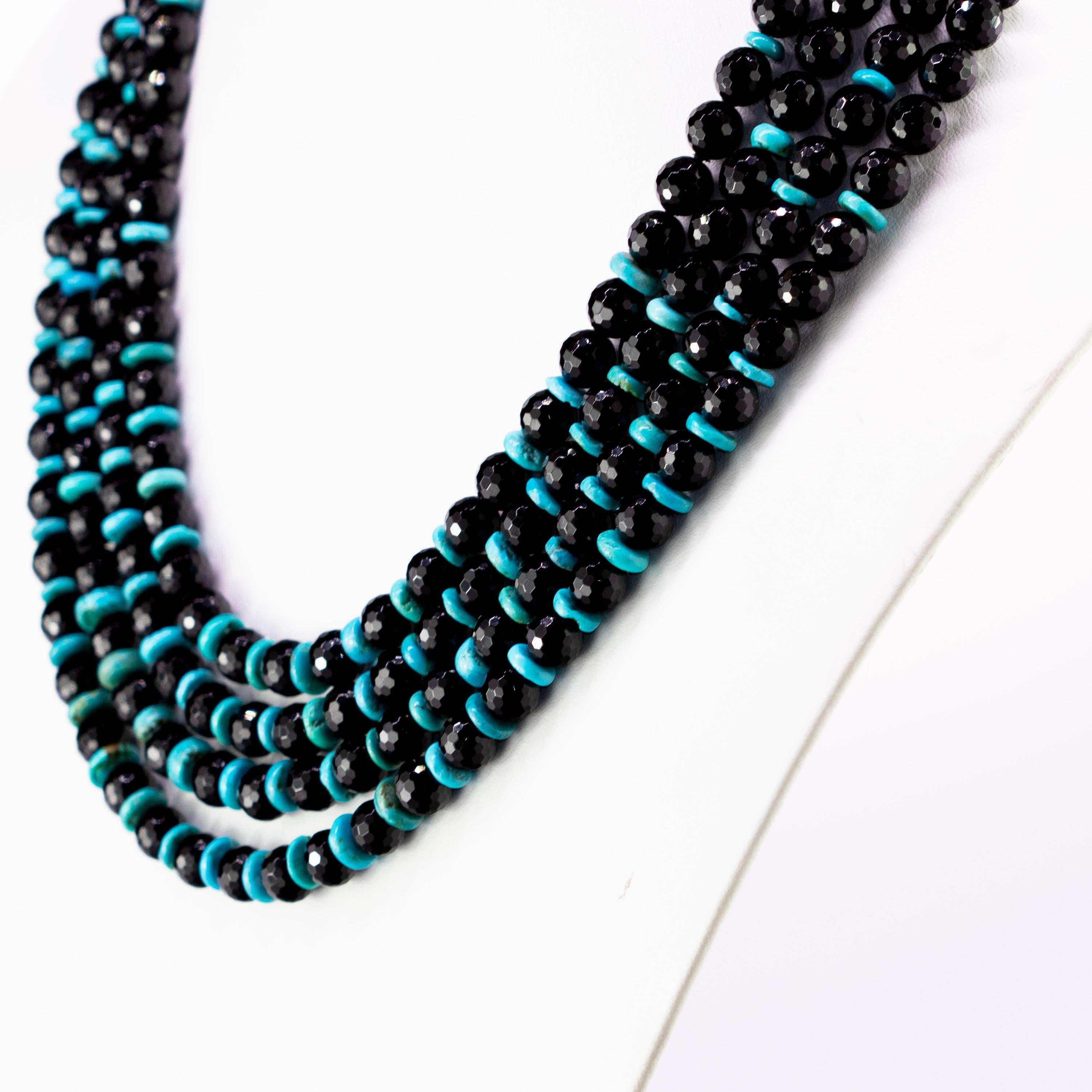 Abstract designs and dramatic contrasting colors is what you can find in this stunning necklace. Faceted black agate strands embellished with light-blue turquoises.

The turquoise has been used as a valuable ornament for ages. Its name is related to