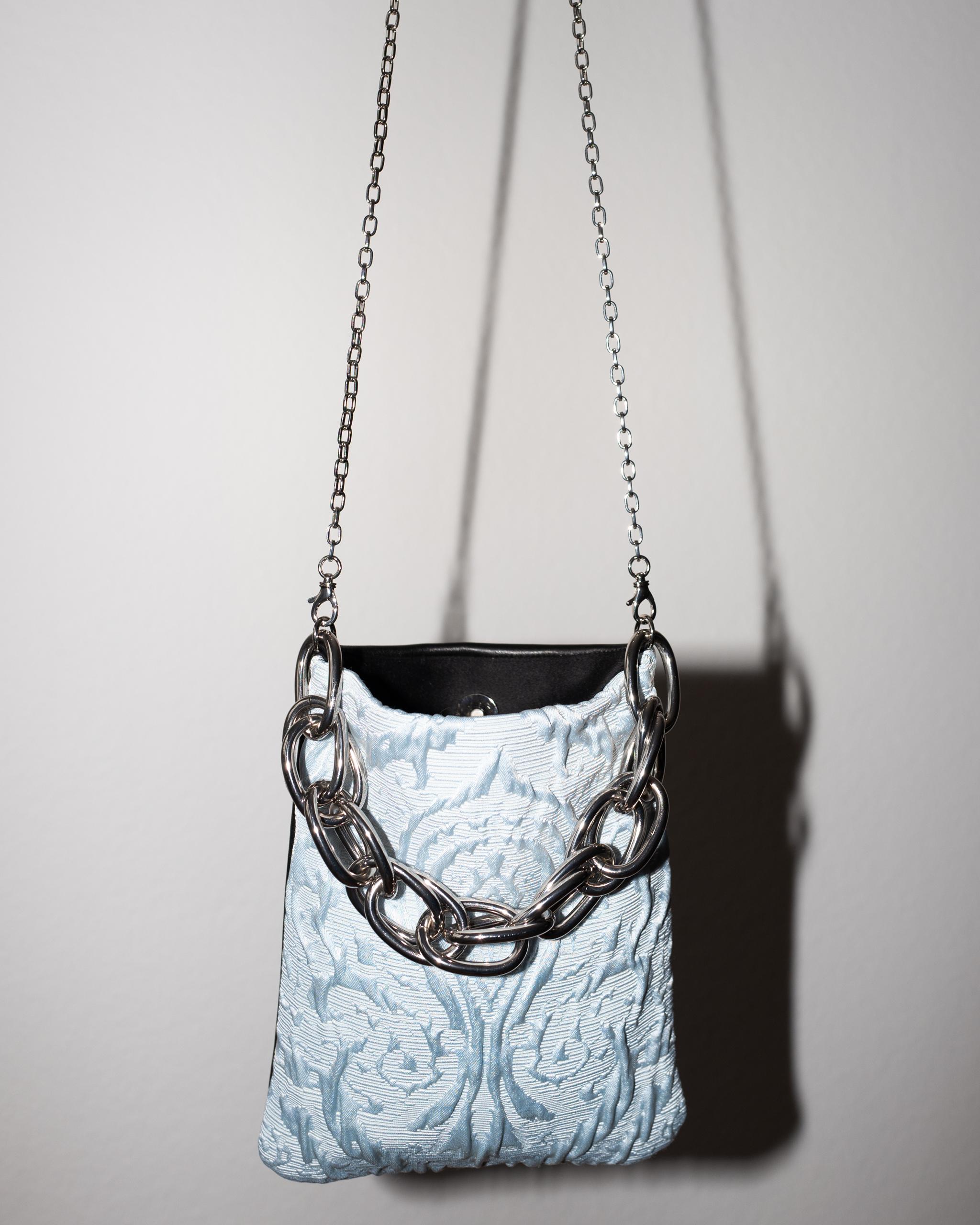 One of a kind Evening Light Blue Vintage Floral Brocade Black Leather Evening Shoulder Bag with Chunky Chain Handle and Long Chain in Palladium Plated Brass J Dauphin

Size: Height 21 cm, Width 17 cm, Length of Chain including Hooks 111 cm

Brand: J