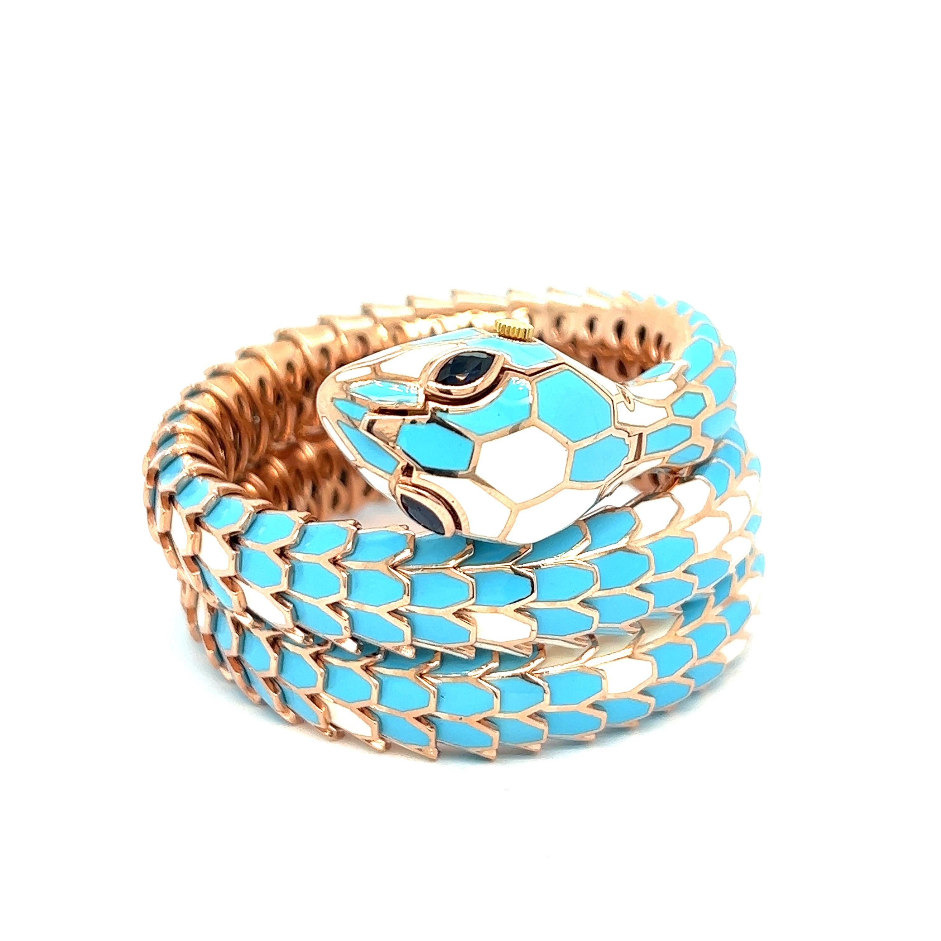 Light blue and white enamel sapphire snake wrap watch bracelet, 3 rows

Marquise-shaped sapphires of 0.55 carats, 18 karat white gold, and silver with a tone of rose gold; marked 750, 925, BEW005RM05M02-0129

Size: inner circumference 6 inches,