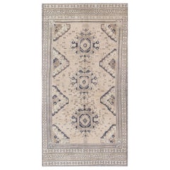 Light Blush and Navy Blue Vintage Turkish Oushak Rug with Tri-Medallion Design