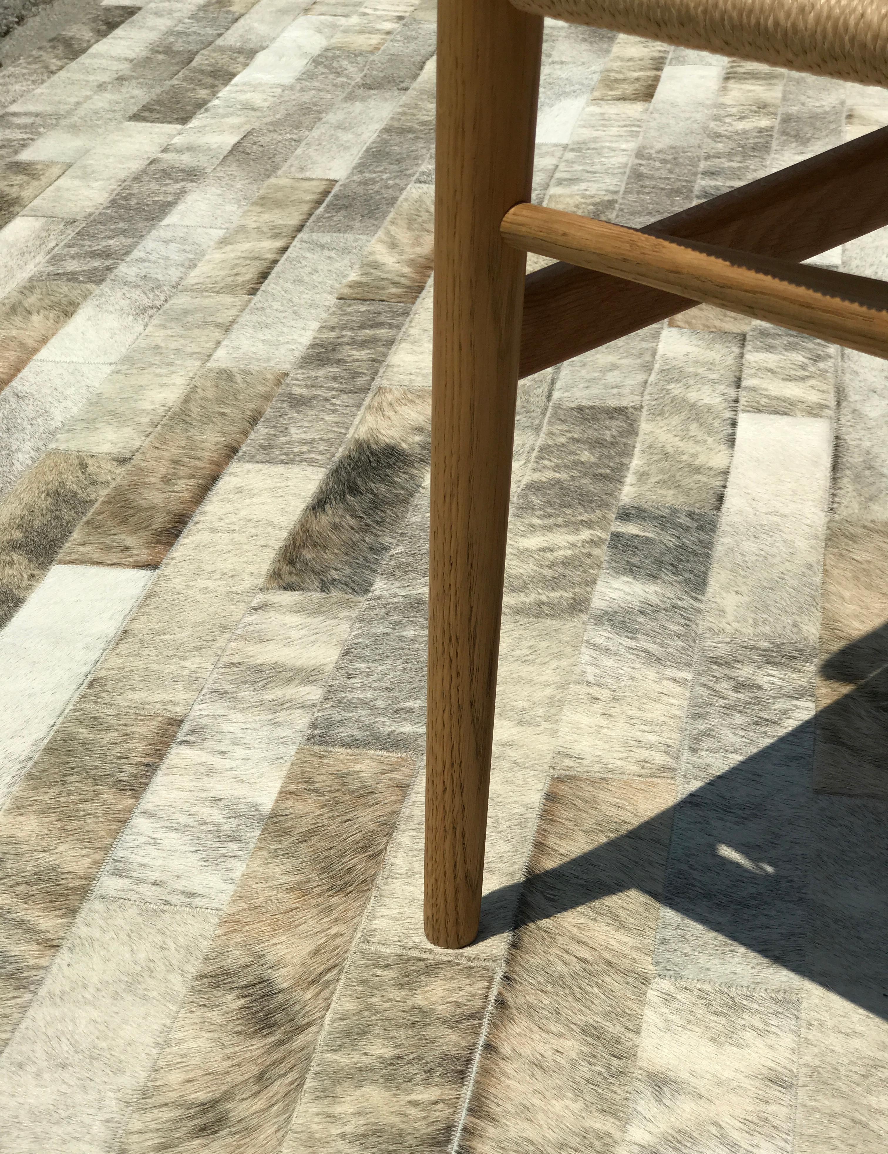 Pure by Grand Splendid
Inspired by British brick architecture from the early 20th century, the Linea cowhide rug features a sleek, linear pattern and a deliciously natural surface. Made with light brindle cowhide, the Linea Light Brindle features a