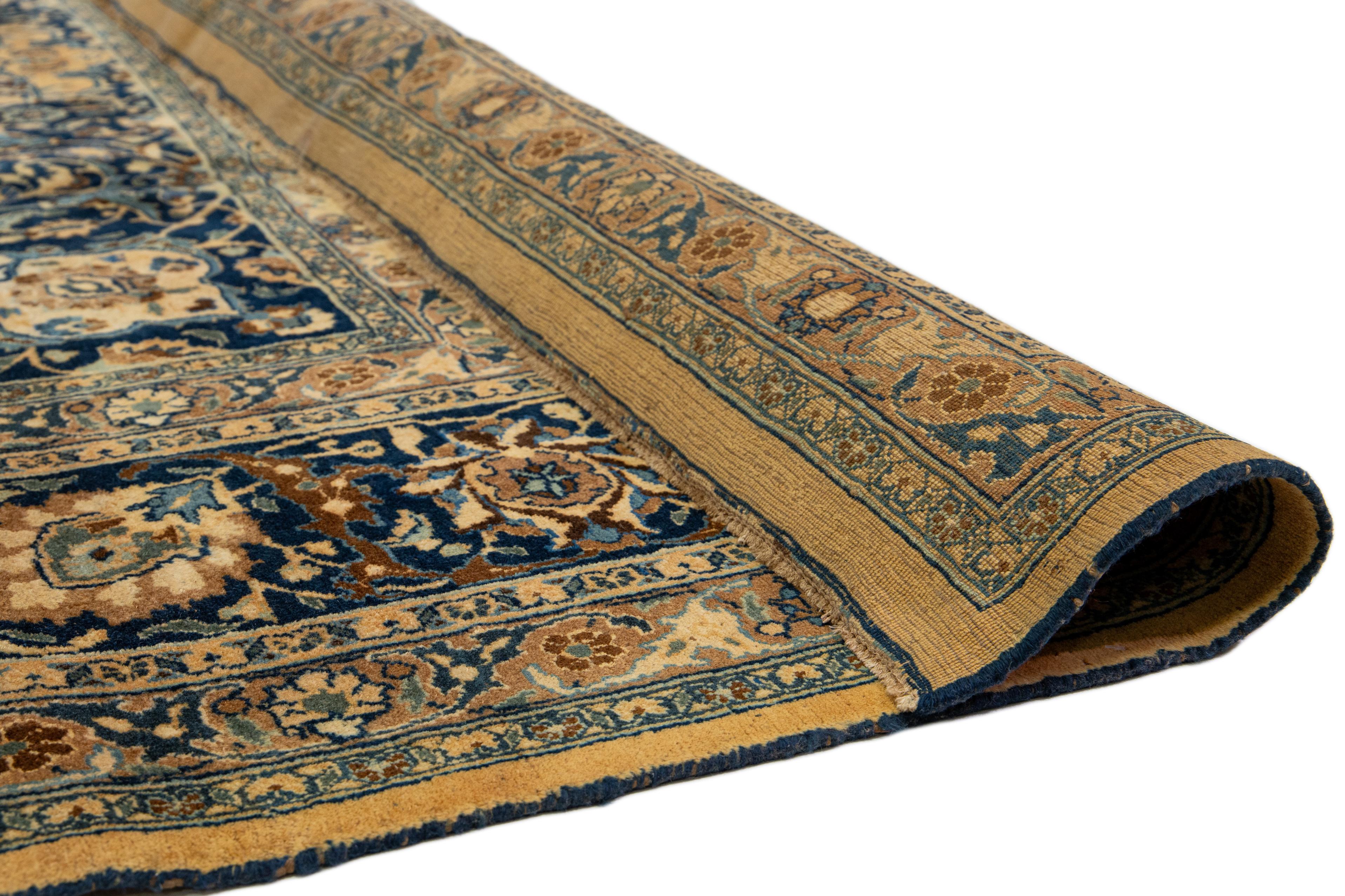 Hand-Knotted Light Brown Antique Persian Mashad Handmade Wool Rug With Rosette Motif For Sale