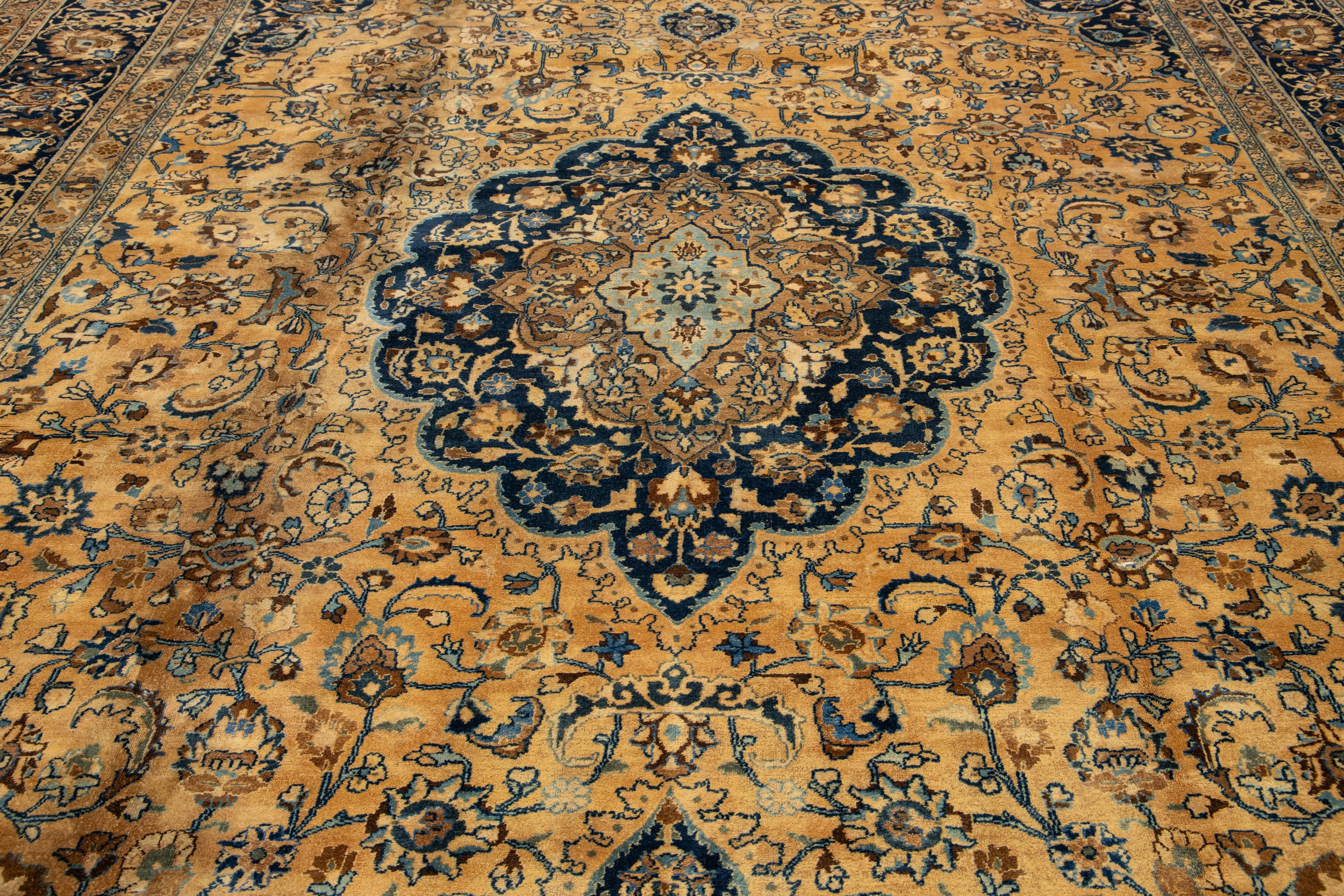 Light Brown Antique Persian Mashad Handmade Wool Rug With Rosette Motif For Sale 2