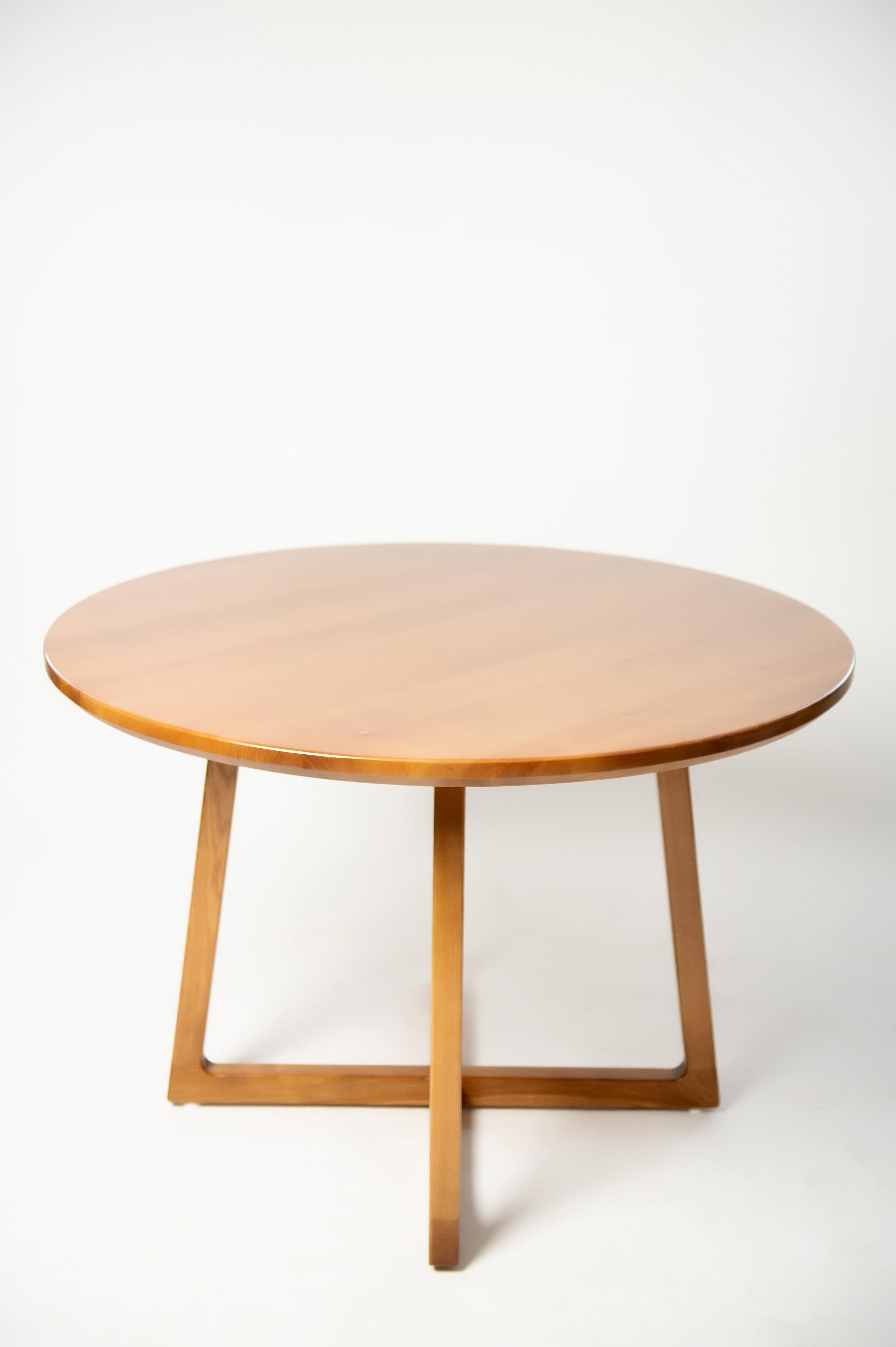 light wood round dining table