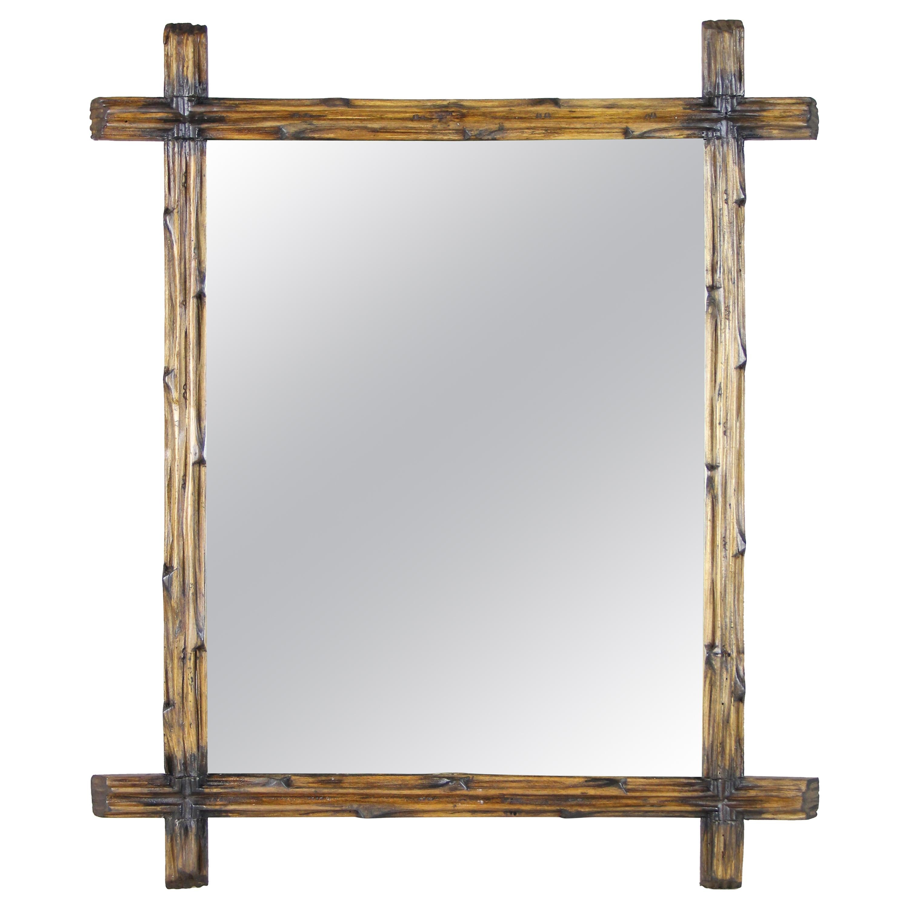 Light Brown Black Forest Wall Mirror with Blackened Accents, Austria, circa 1890 For Sale
