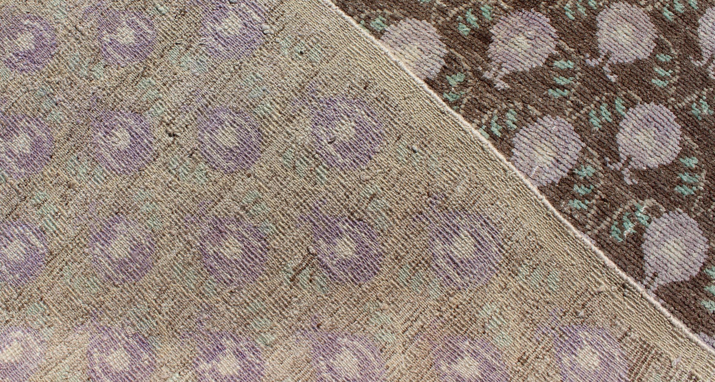 20th Century Light Brown, Green, and Lavender Turkish Tulu Vintage Rug with Latticework For Sale