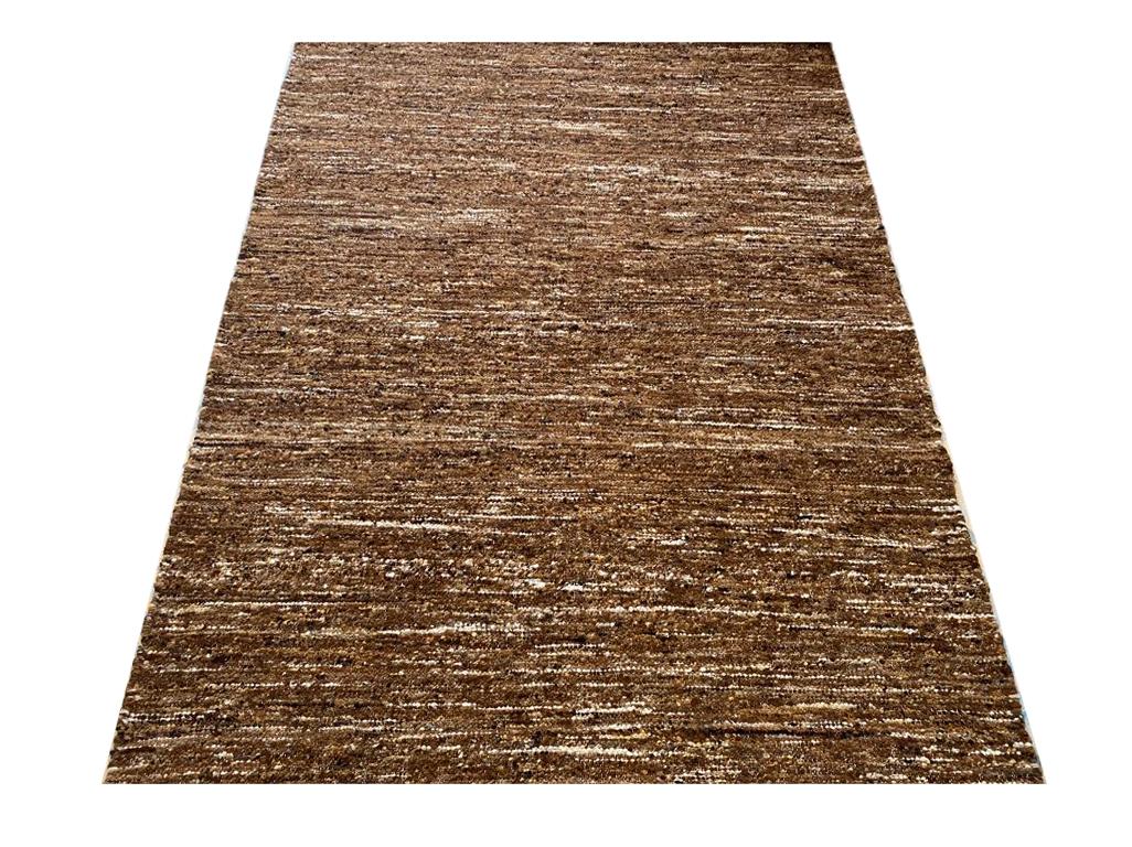 Hand-woven raw wool.

8' x 10'

New

Origin: India

Field Colors: Light-Brown

Accent Colors: Brown, Beige, Ivory