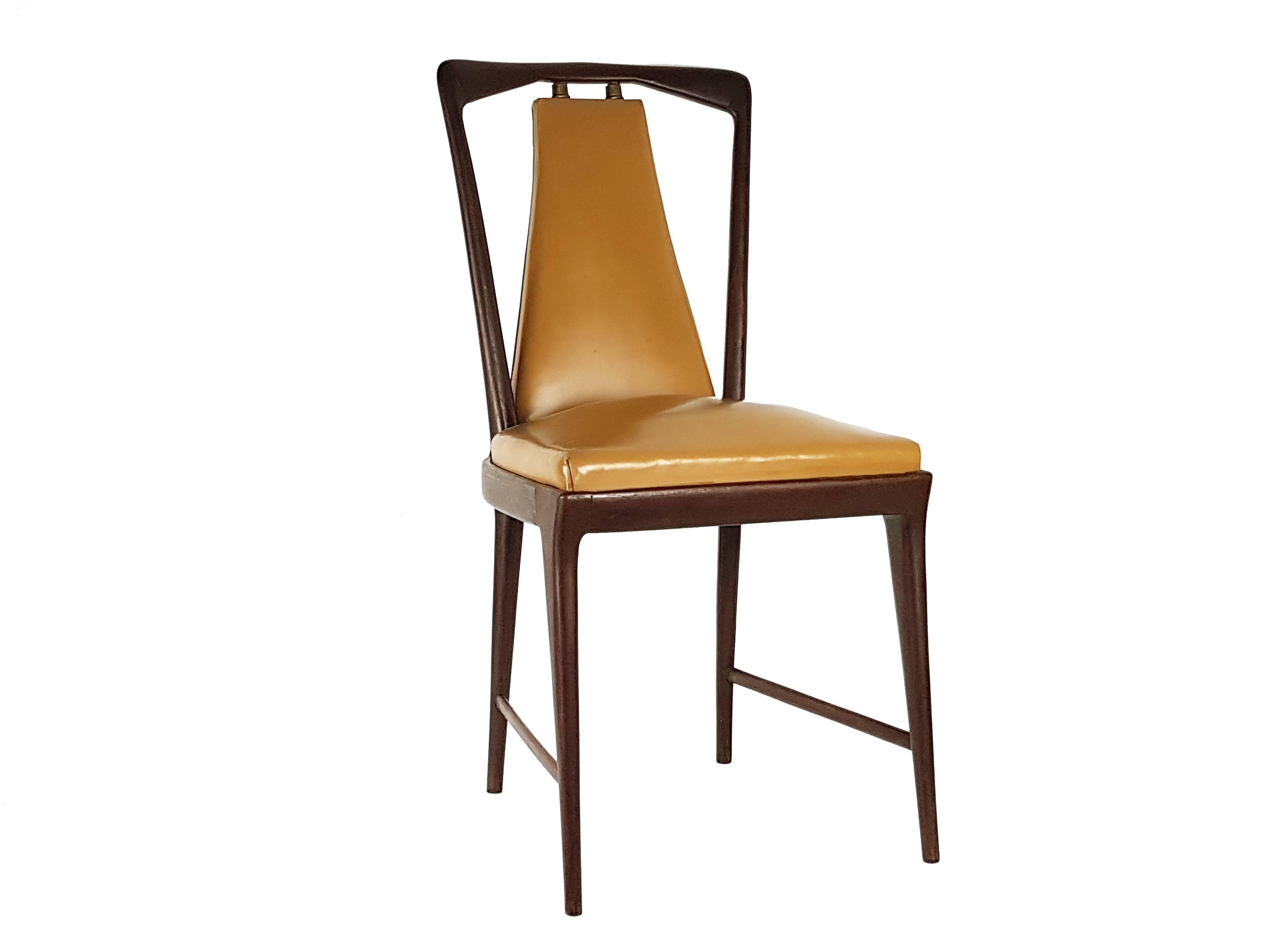 This set of 6 dining chairs was produced in Italy by Fossati, Attilio & Arturo in the late 1940s. The chairs are made from dark-brown wooden structure with a light-brown skai seat and back. The set remains in very good vintage condition.